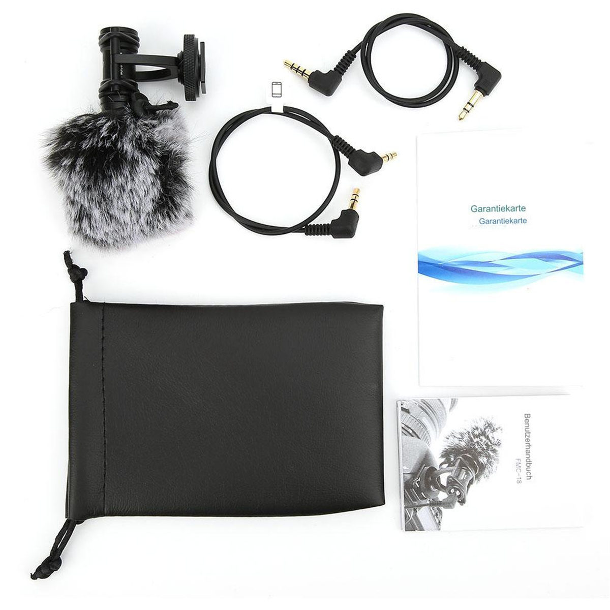 Ein Mikrofon-Kit mit Zubehör, einschließlich Kabeln, einem Beutel und einer Anleitung.