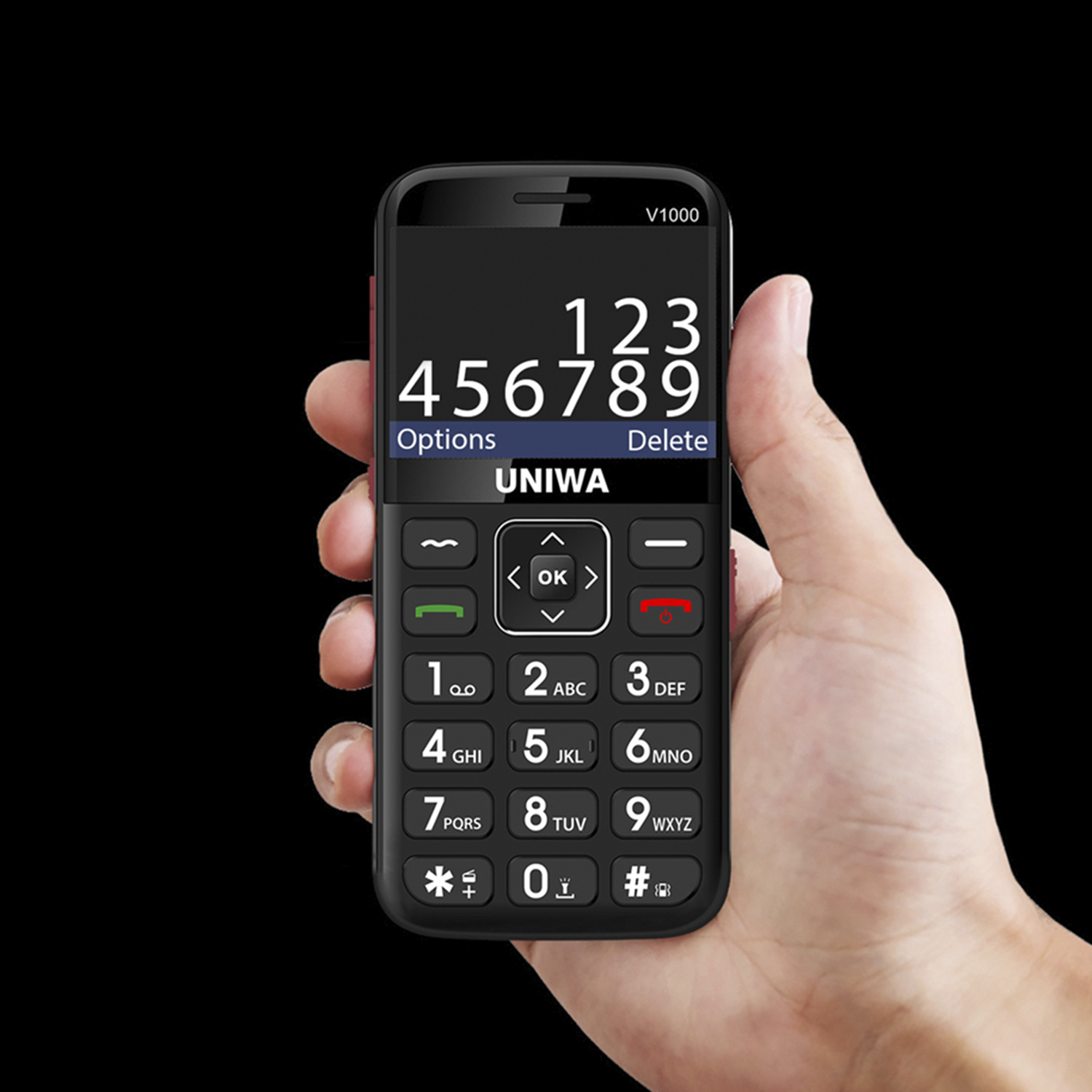 Una mano sosteniendo un teléfono móvil negro con números y botones grandes, etiquetado UNIVA.