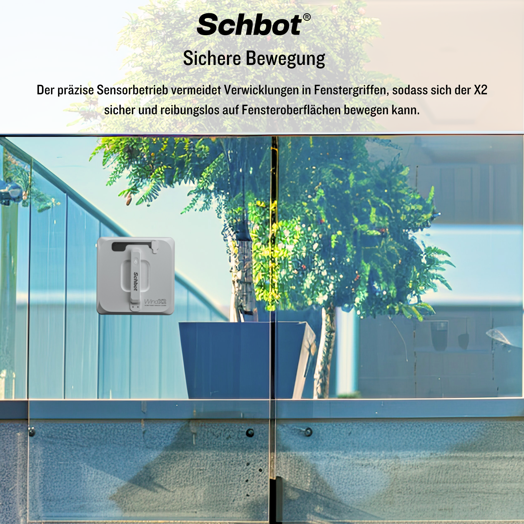 Fensterputzroboter an einer Glastür, grüne Pflanzen im Hintergrund.
