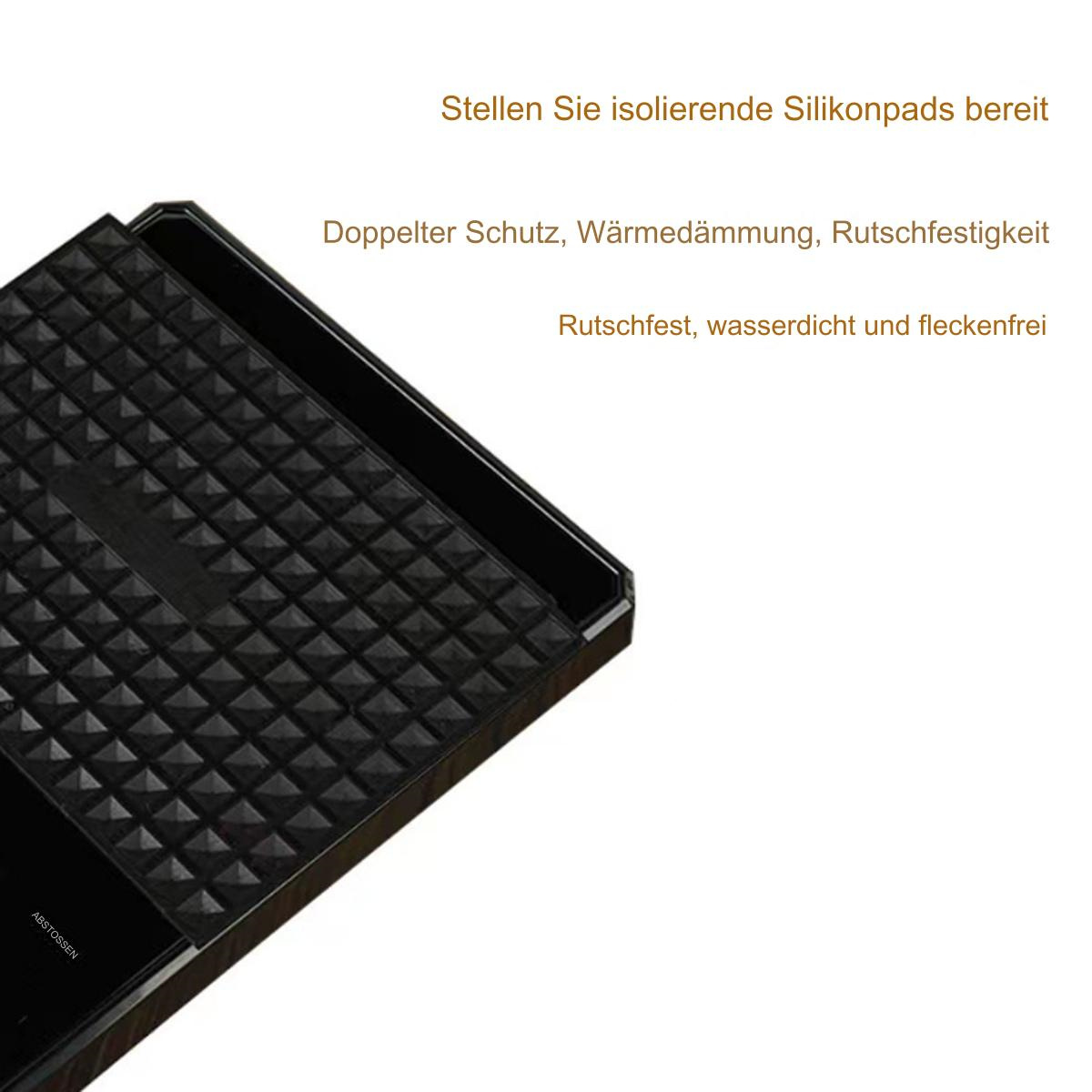 Schwarzes Silikonpad mit strukturierter Oberfläche, verwendet auf schwarzer Oberfläche.