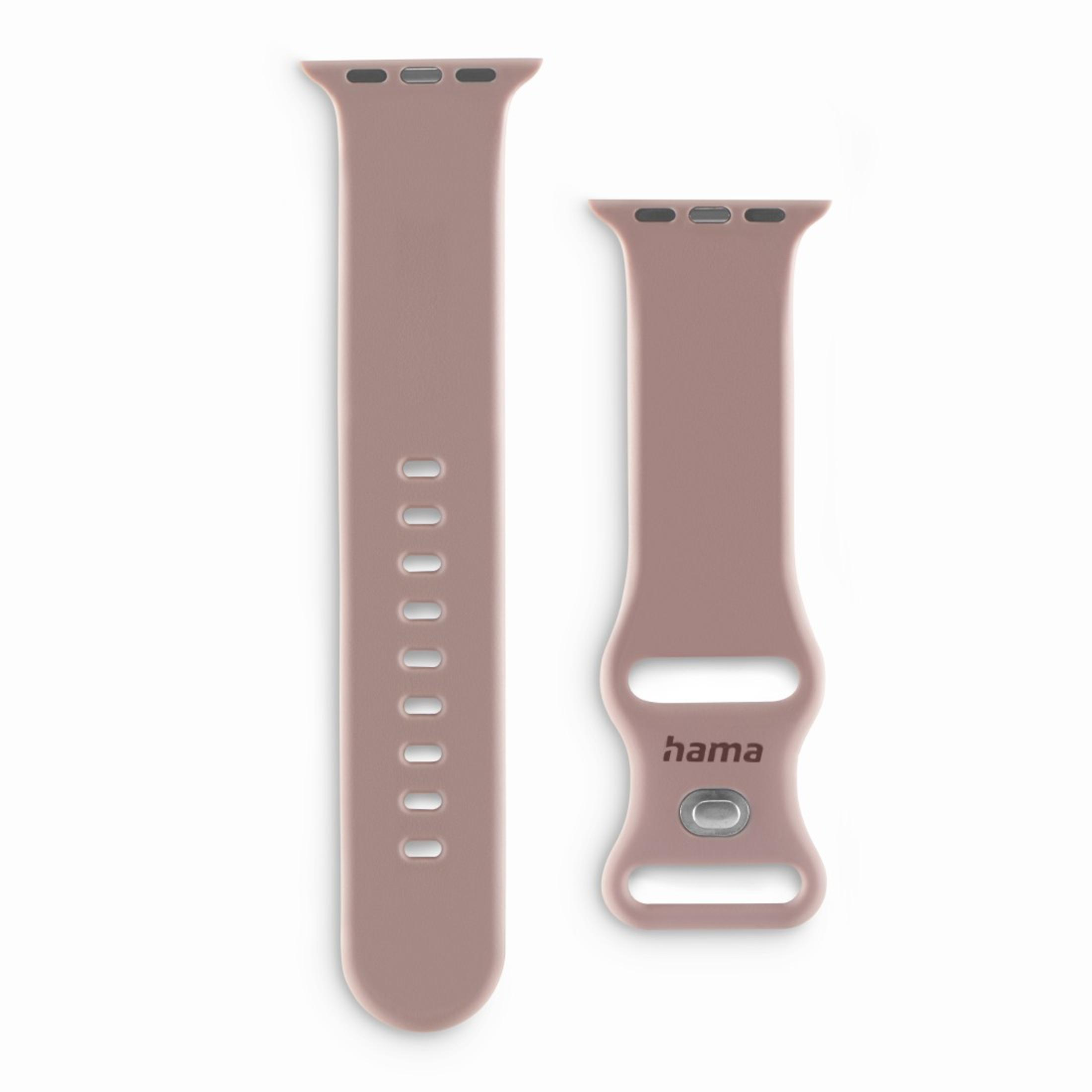 Due cinturini rosa. Uno ha la parola 'hama' sopra, l'altro ha dei fori.
