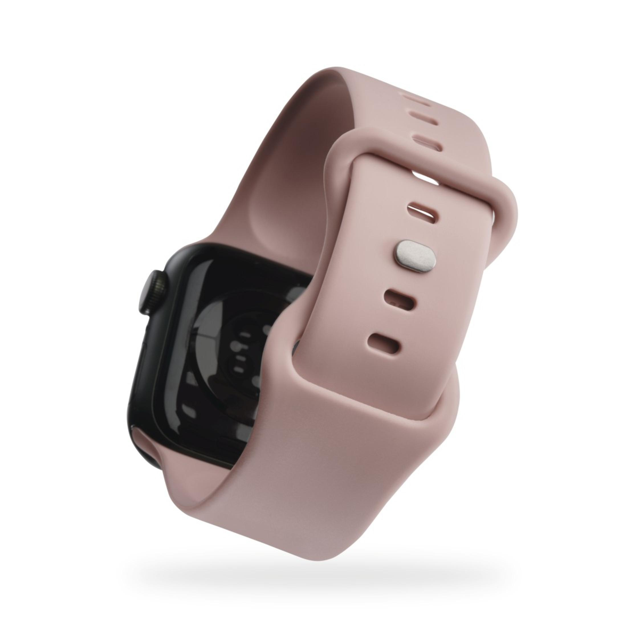 Un Apple Watch rosa con schermo nero e cinturino rosa su sfondo bianco.