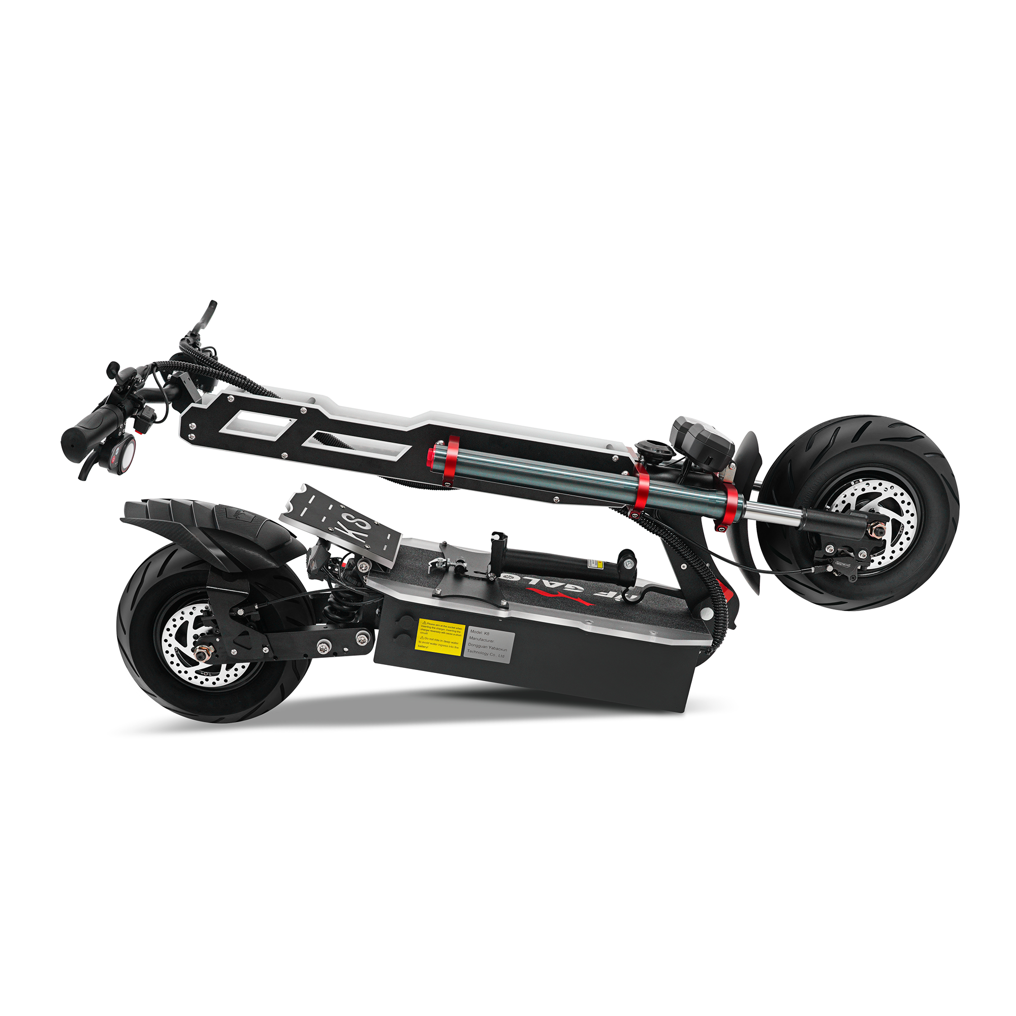 Hulajnoga elektryczna. Czarna i srebrna, leżąca na boku. Grube opony. Widoczna kierownica.