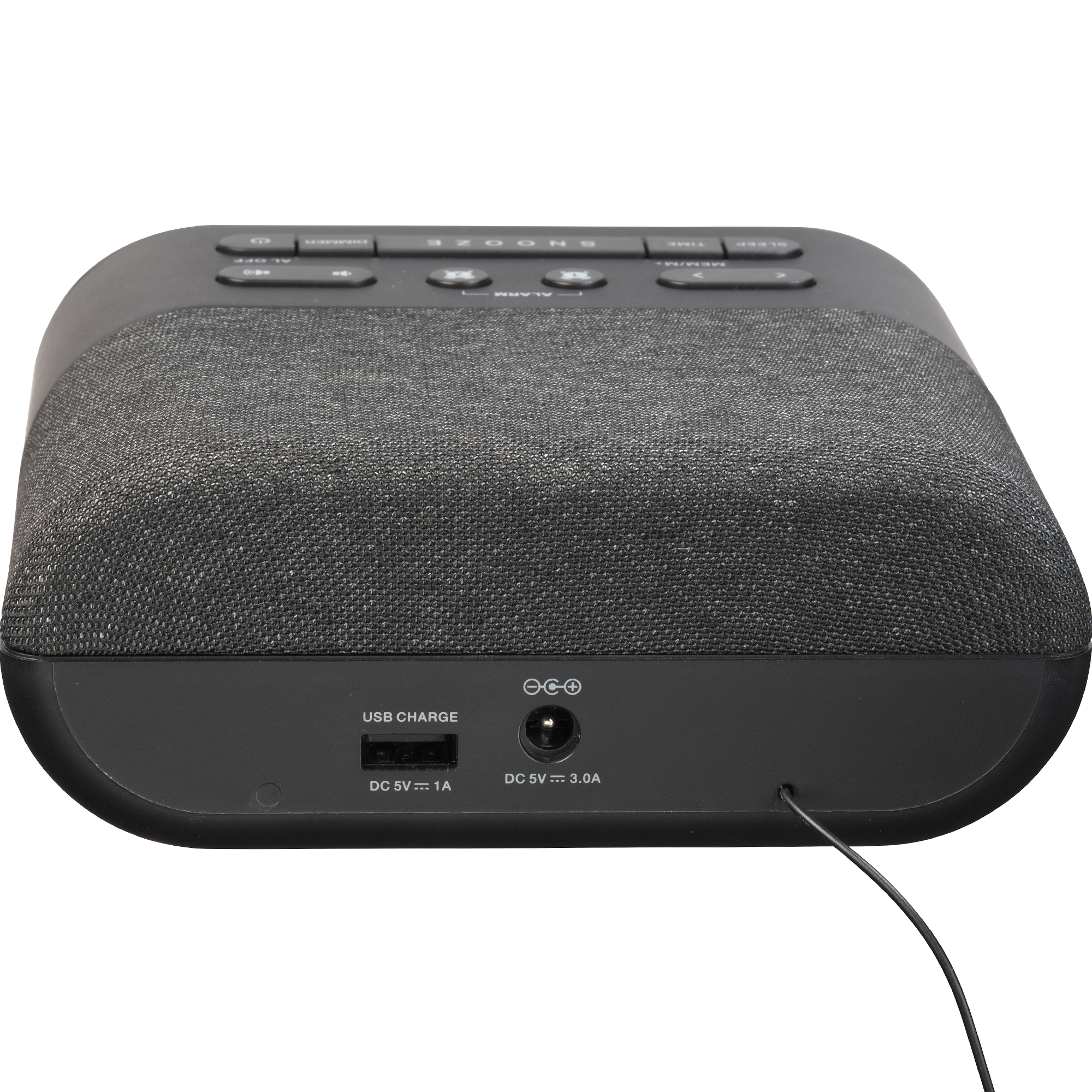 Black alarm clock with buttons on top. USB port and power input are visible on the back. A black wire is plugged.
