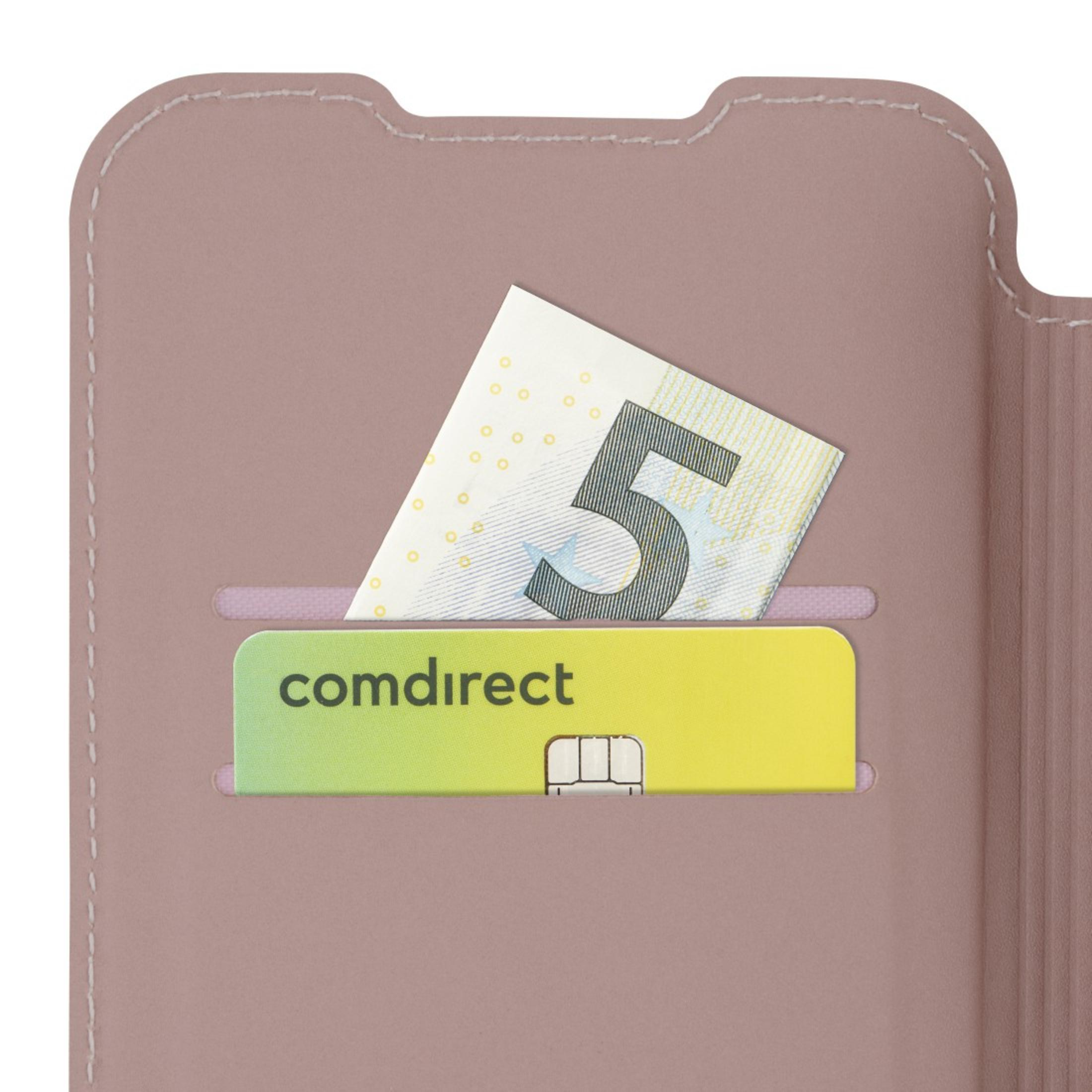 Primo piano di una custodia rosa per telefono con una banconota da cinque euro e una carta di credito negli slot.