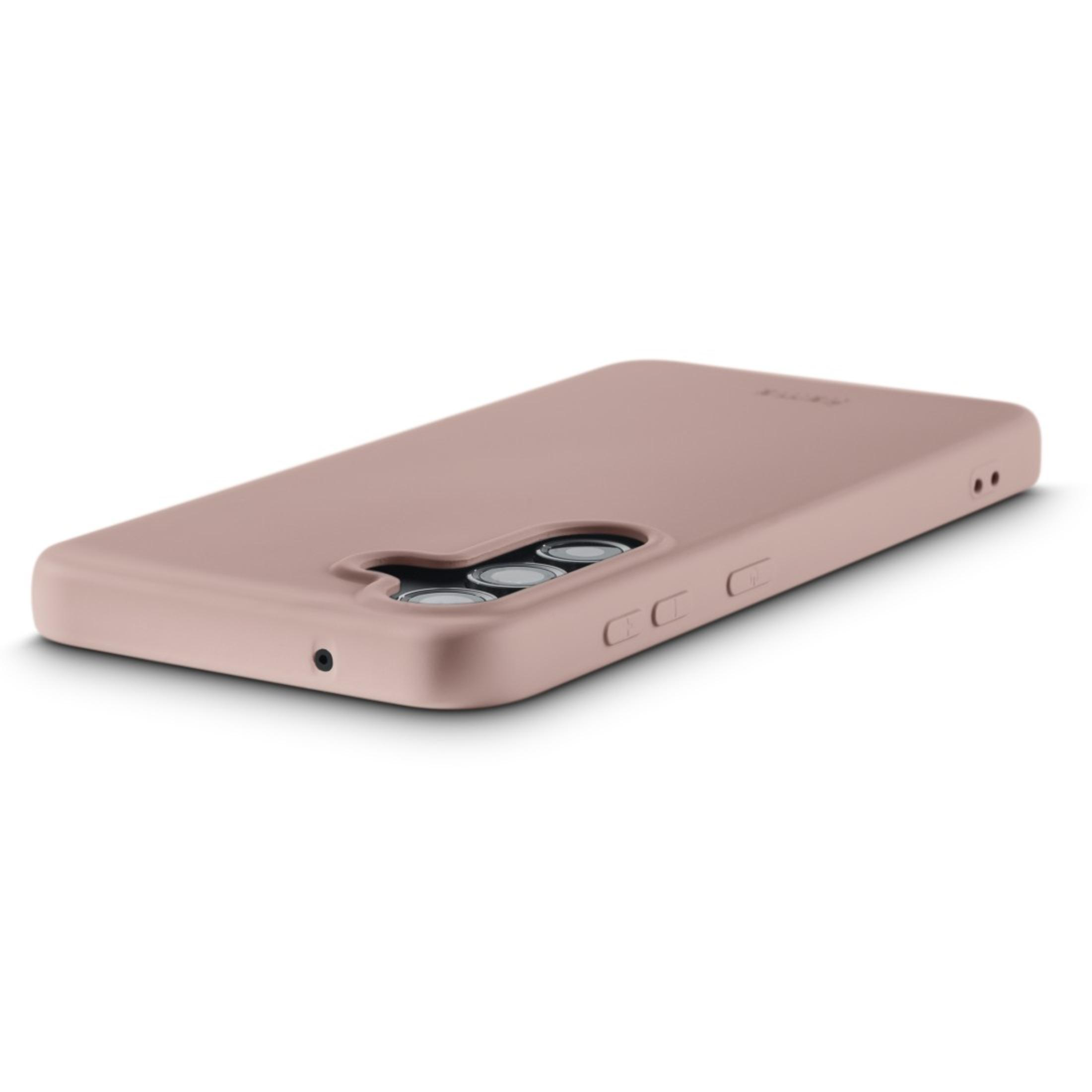 Une coque de téléphone rose avec une découpe pour la caméra, vue d'en bas.