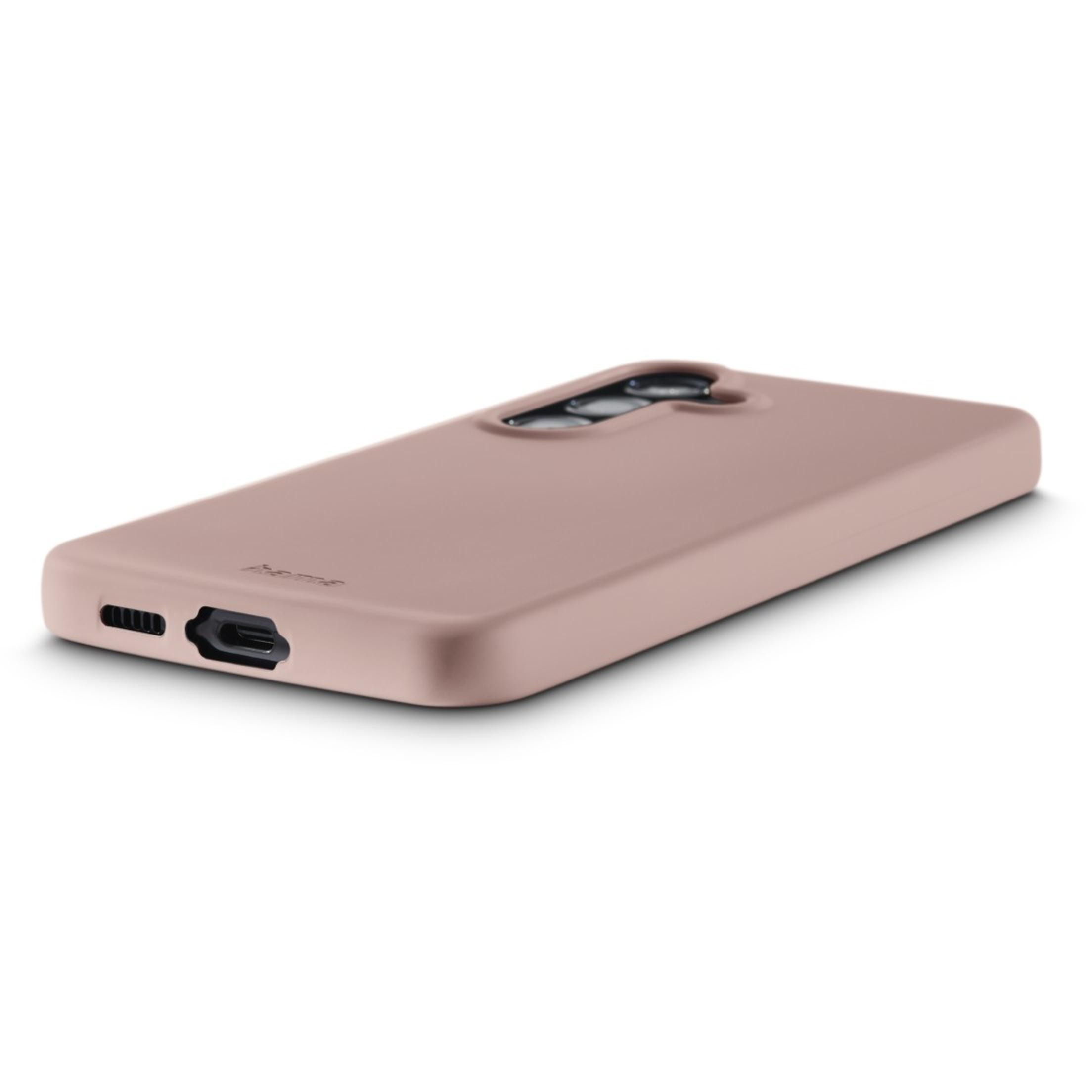 Coque de téléphone rose avec découpe pour l'appareil photo. La coque est lisse et en matière souple.