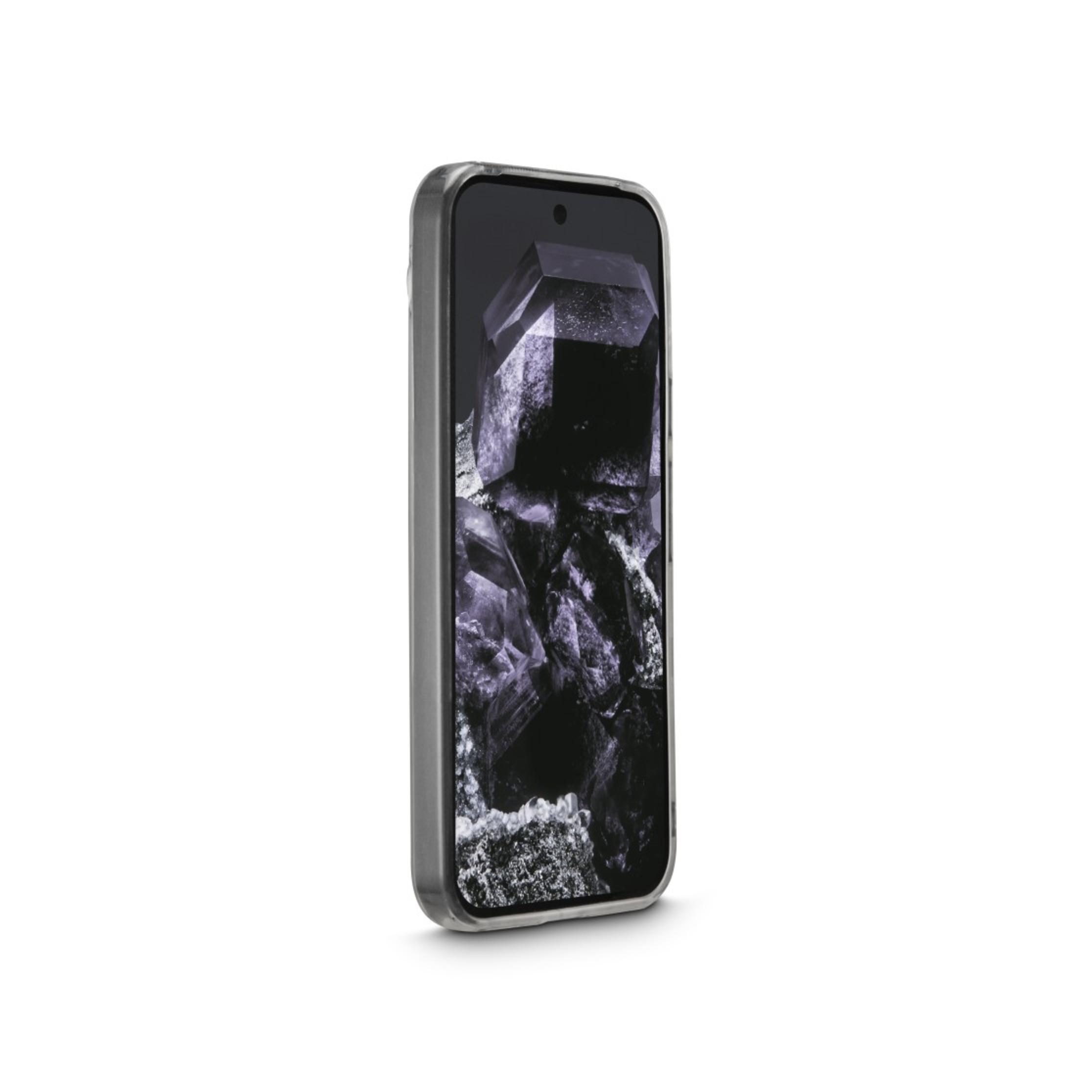 Un smartphone avec un écran noir affiche une formation rocheuse. Il a une coque transparente.