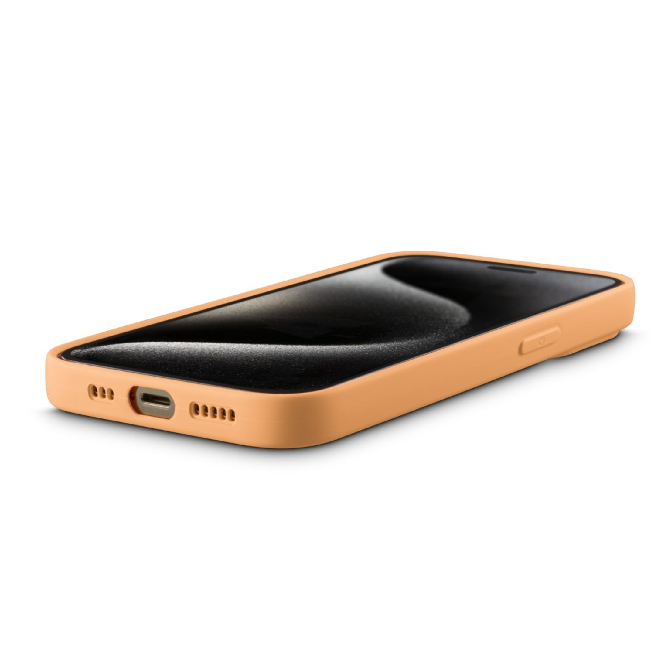 Un étui de téléphone orange avec un téléphone noir à l'intérieur.