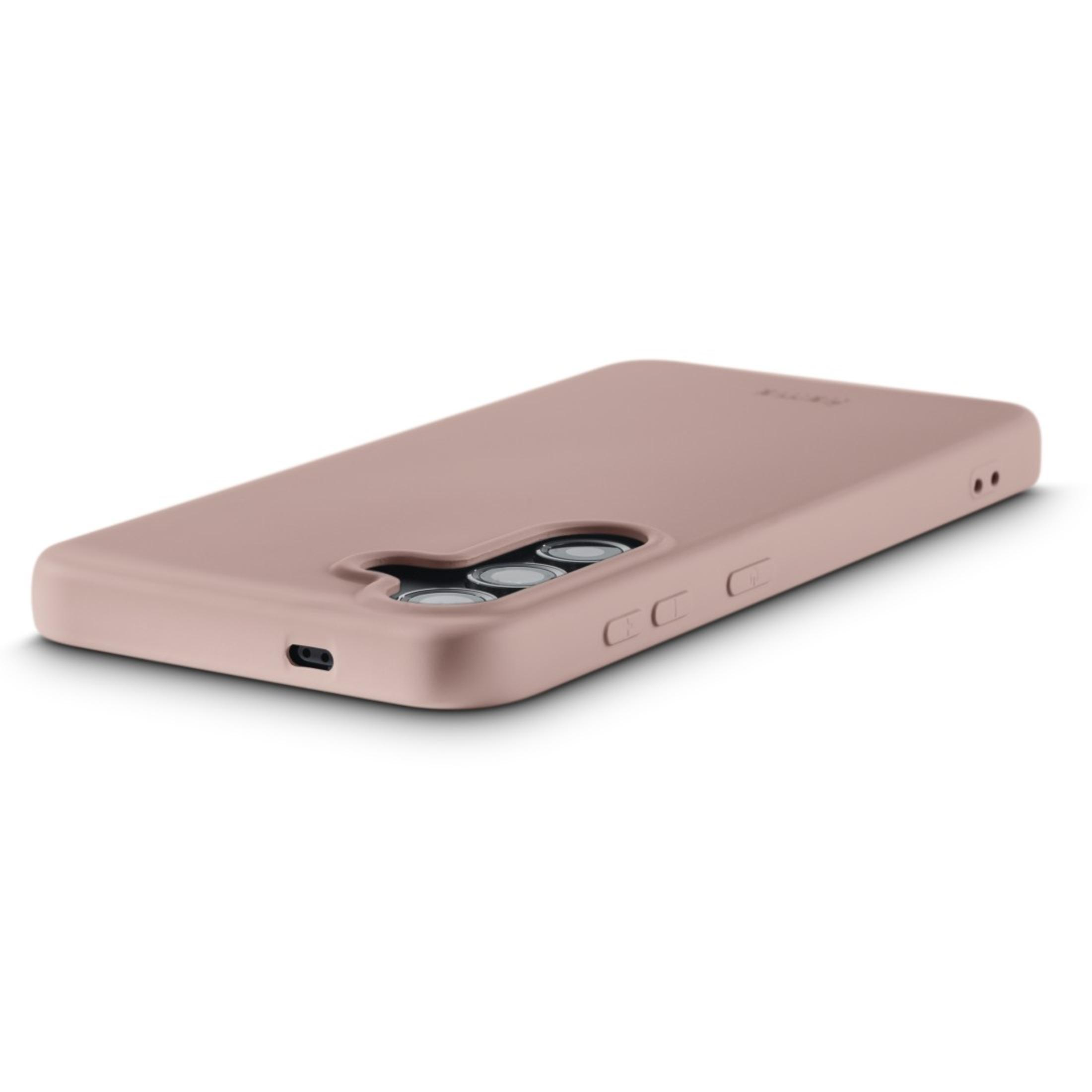 Une coque de téléphone de couleur blush. La coque a des découpes pour la caméra et les boutons.