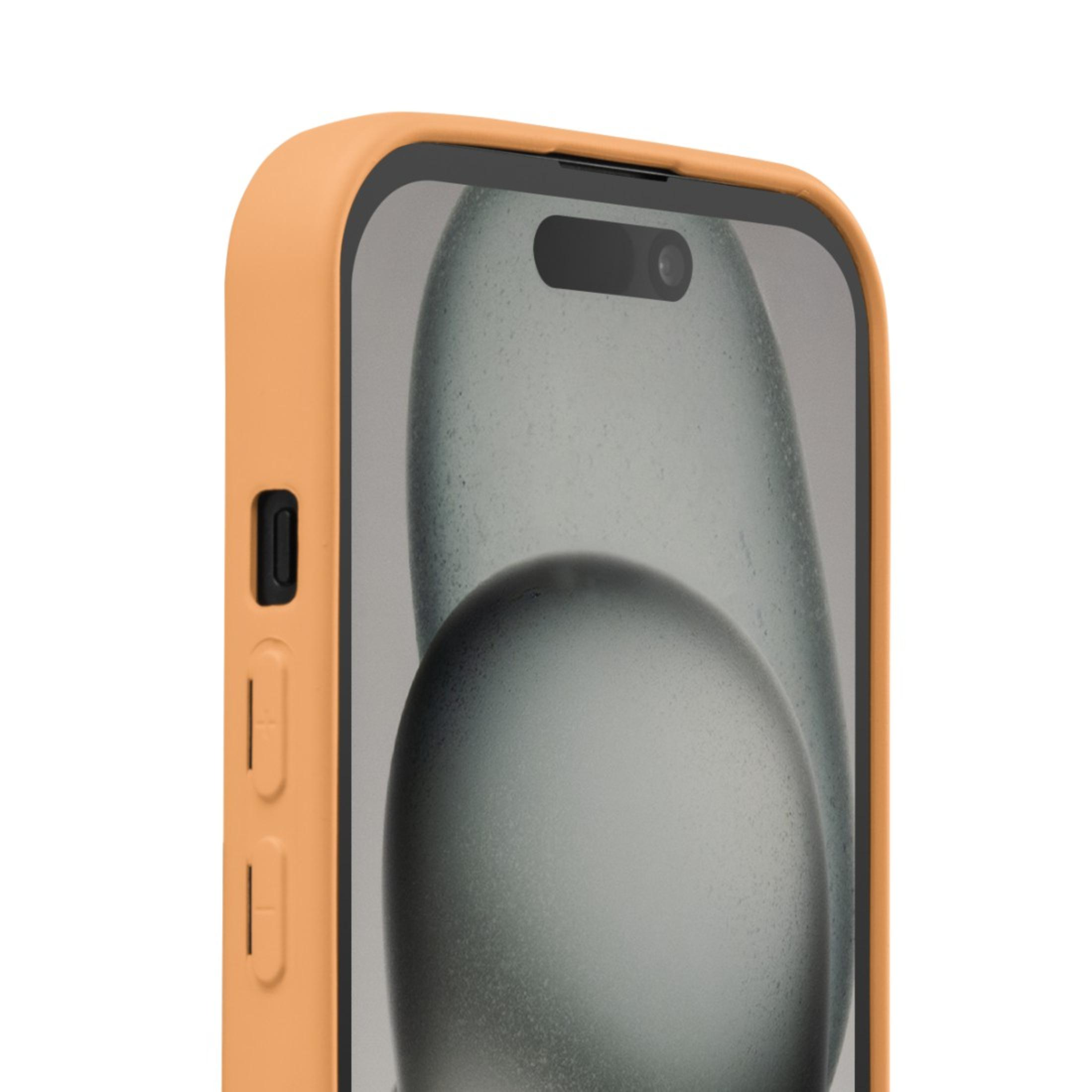 Un téléphone dans un étui orange. La zone de la caméra est visible. L'arrière-plan est une image floue.