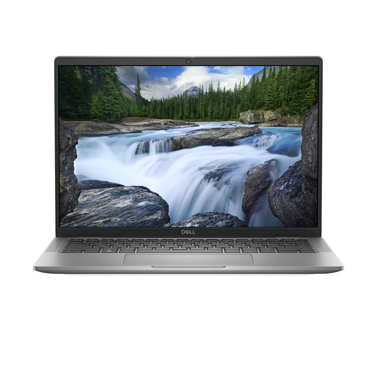 Laptop Dell con escena de montaña y río. El portátil es plateado y tiene un teclado negro.