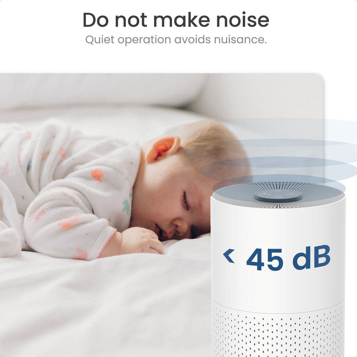 A baby sleeping on a bed. An air purifier is next to the bed. Text on the image says <lt/> 45 dB.