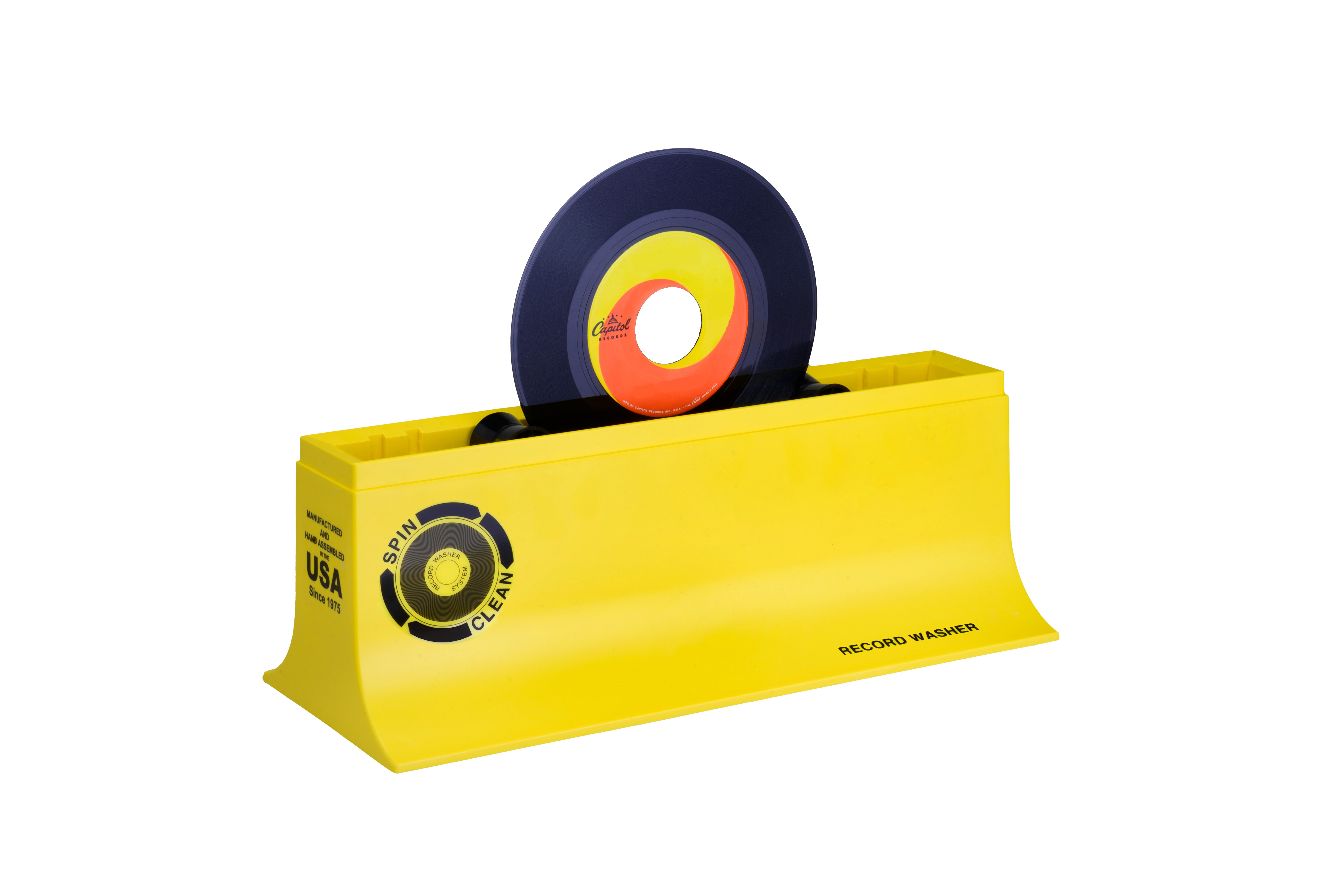 Gelber Plattenreiniger mit einer Platte darin. Text: 'SPIN CLEAN' und 'RECORD WASHER'.