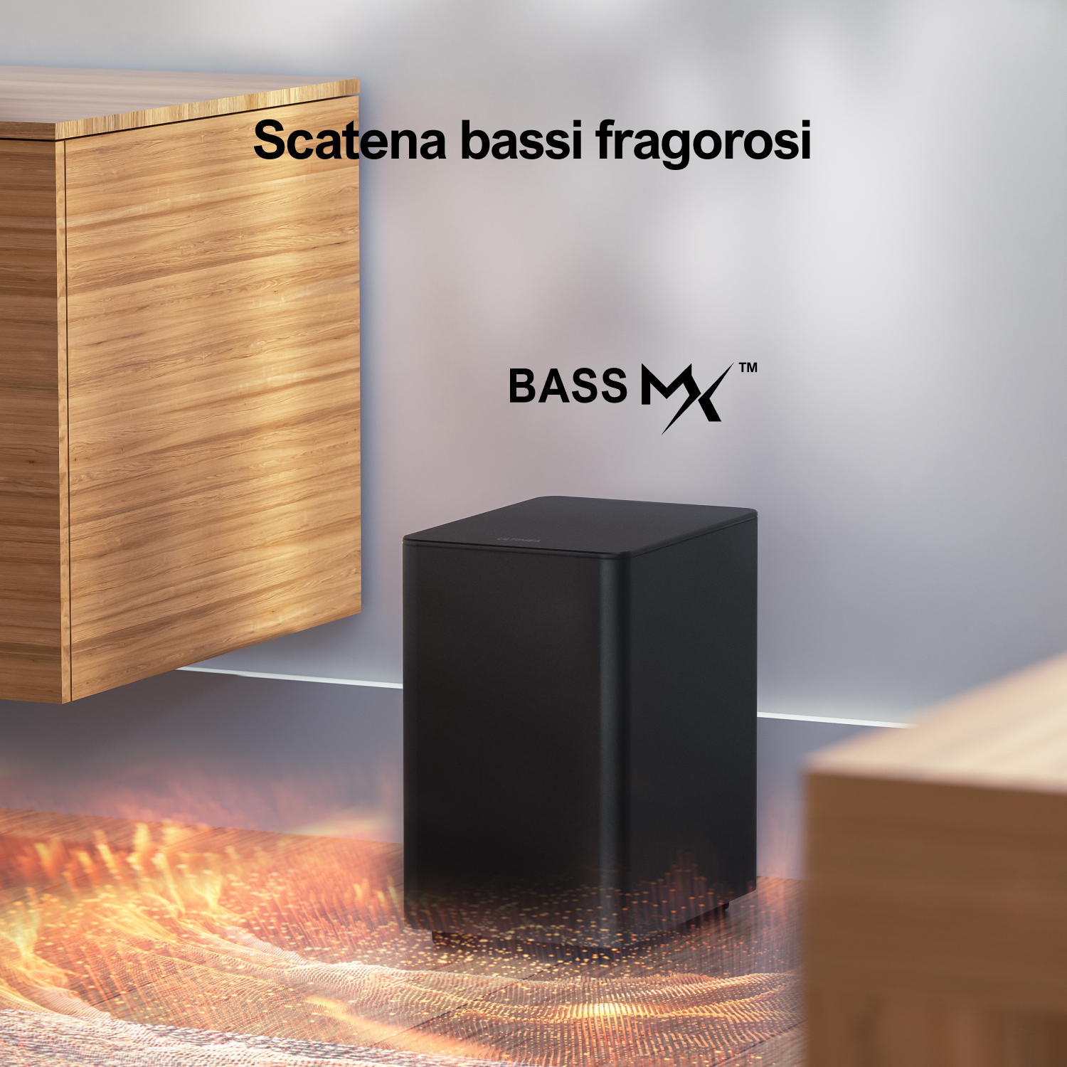 Subwoofer nero con il logo Bass MX, vicino a mobili in legno.