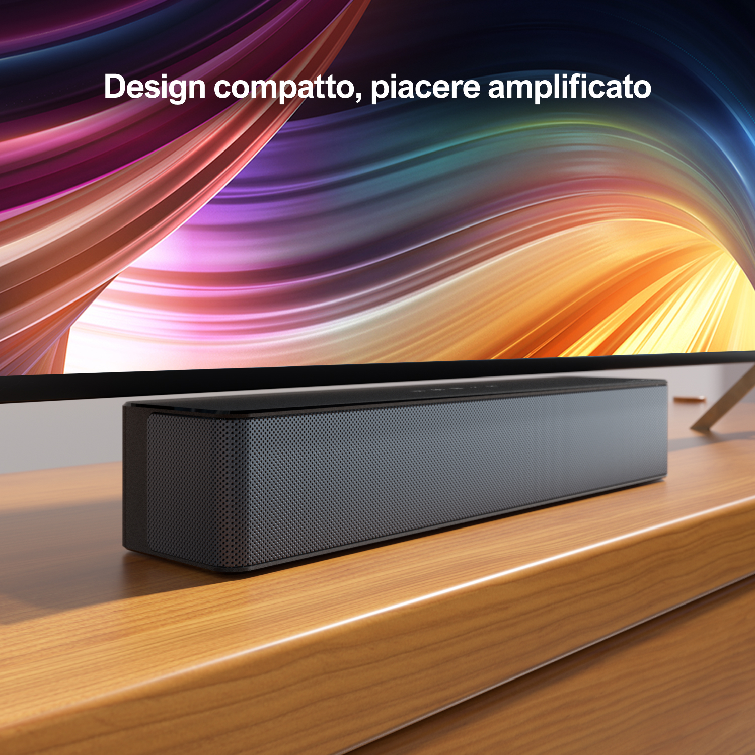 Soundbar su tavolo di legno, testo sopra.