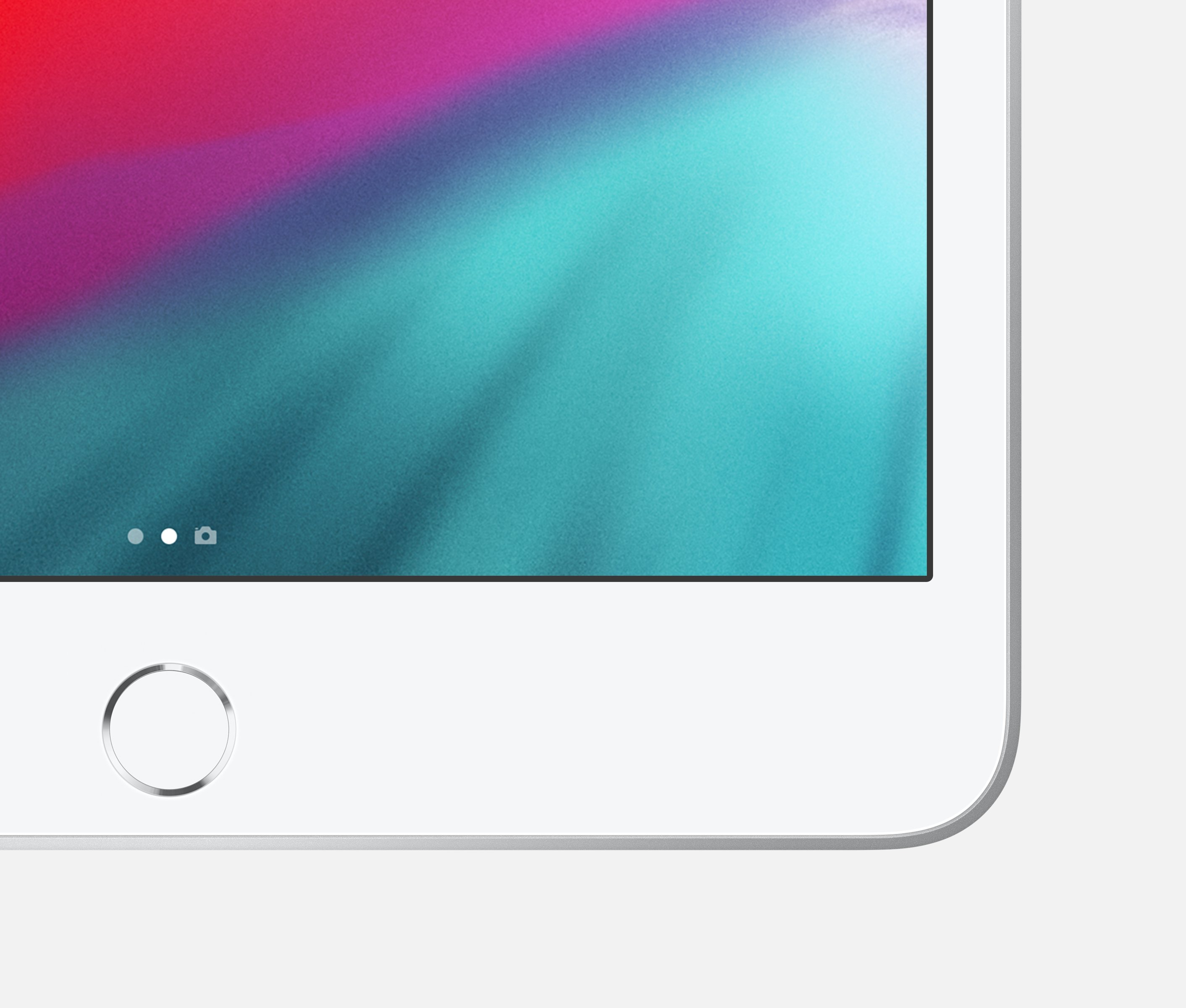 Tablette blanche avec un bouton d'accueil. L'écran affiche un dégradé de couleurs flou.