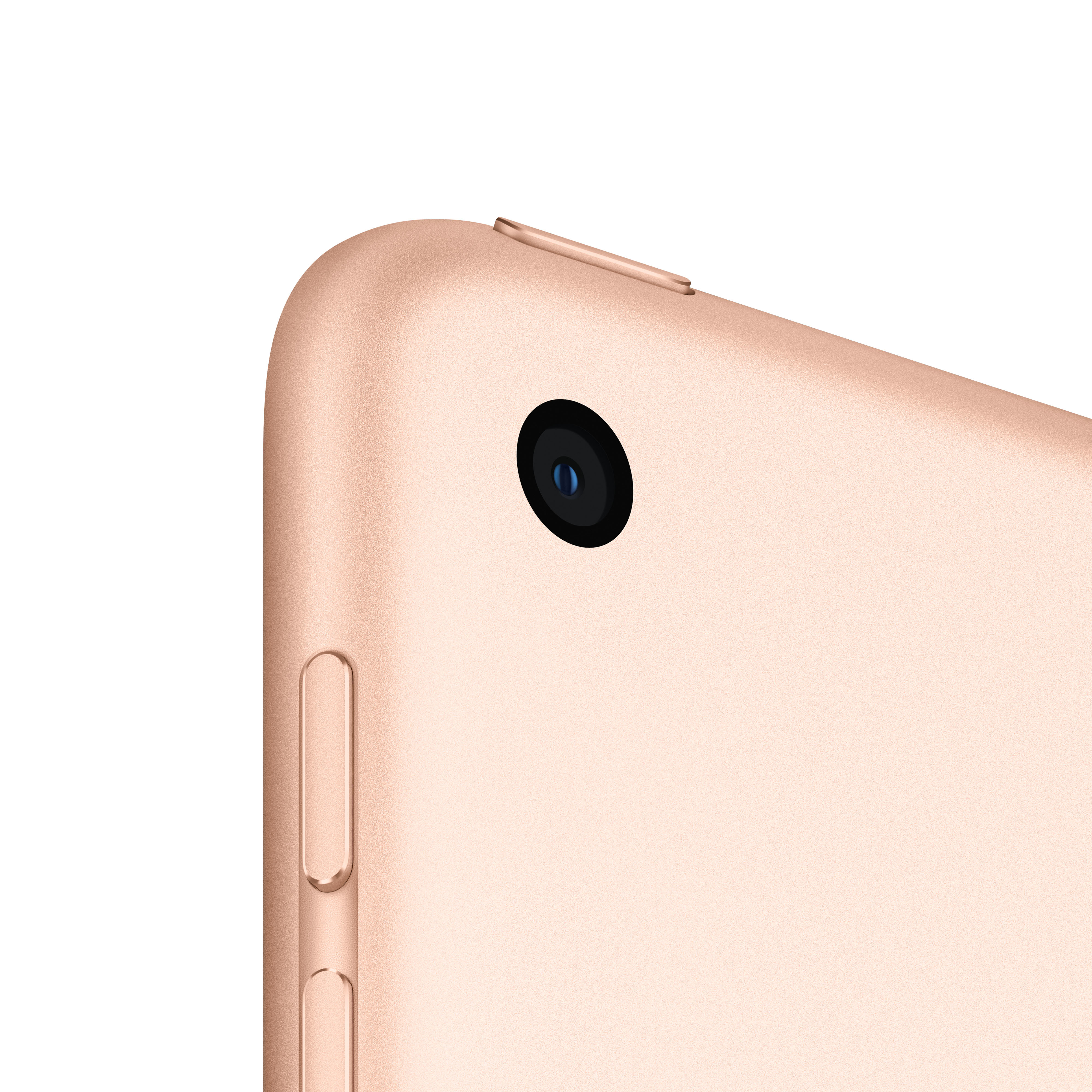 Primer plano de la esquina de un iPad dorado, mostrando la lente de la cámara.