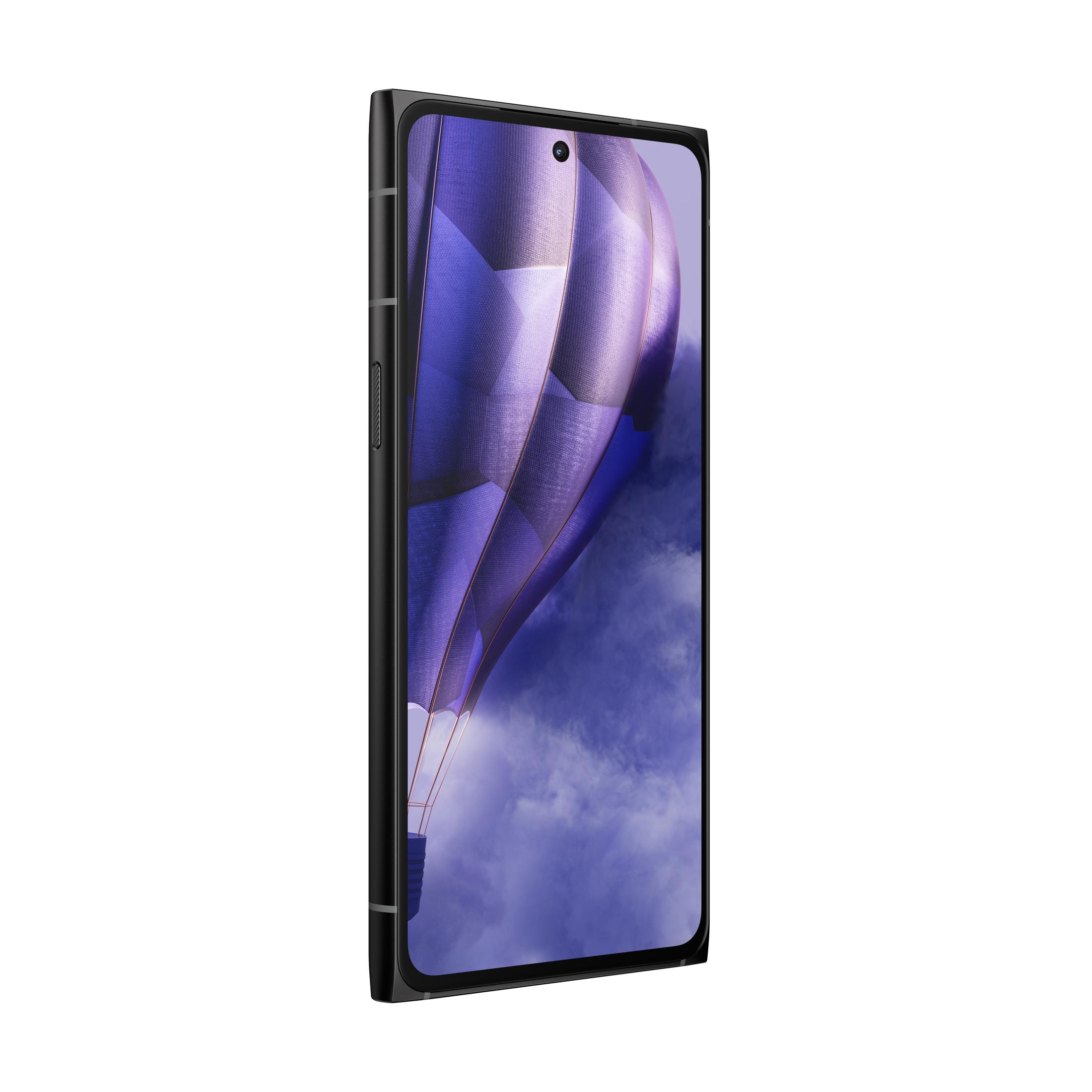 Telefono nero, immagine viola sullo schermo, vista laterale, sfondo bianco.