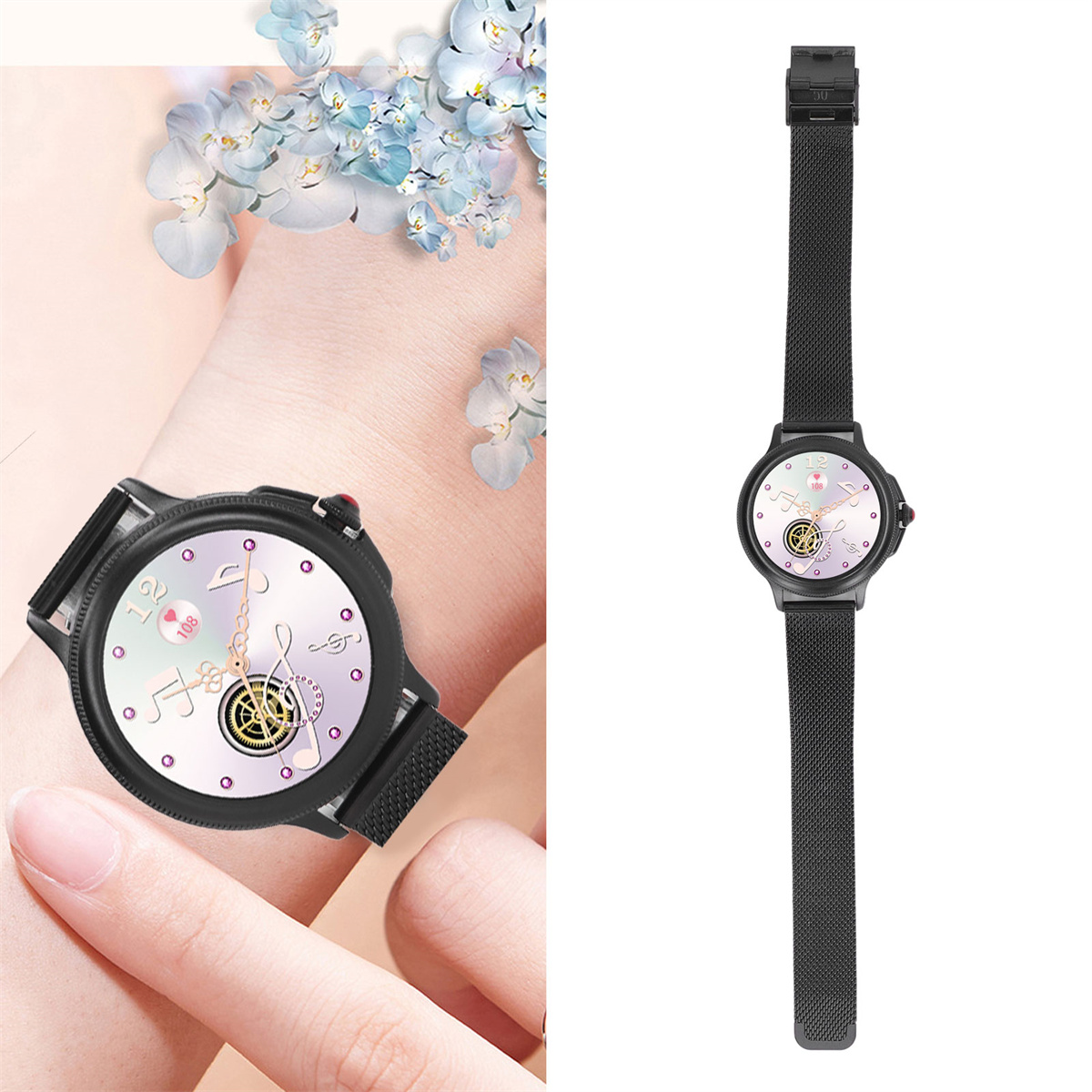Handgelenk einer Frau mit schwarzer Uhr. Das Zifferblatt zeigt Noten und ein pinkes Herz. Schwarzes Armband.