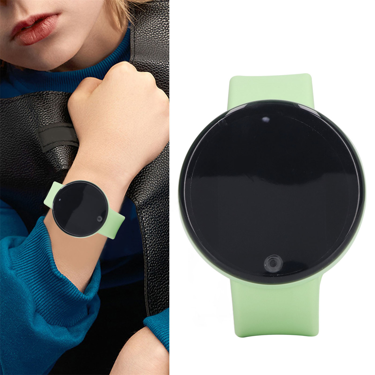 Ein Kinderarm, der eine grüne Smartwatch mit schwarzem Bildschirm trägt, auf weißem Hintergrund.