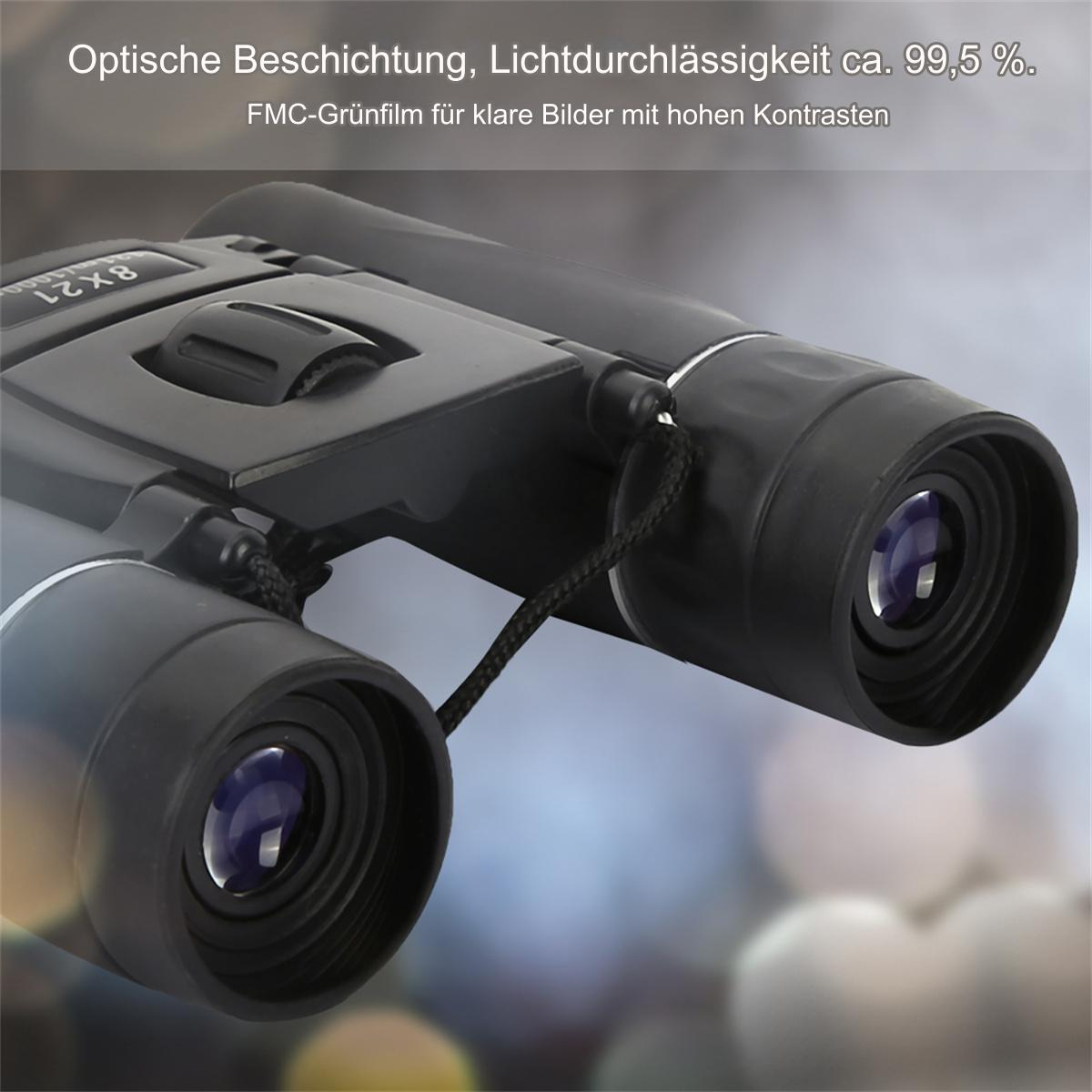 Schwarzes Fernglas mit Text über Lichtdurchlässigkeit und Beschichtung, auf verschwommenem Hintergrund mit Bokeh.