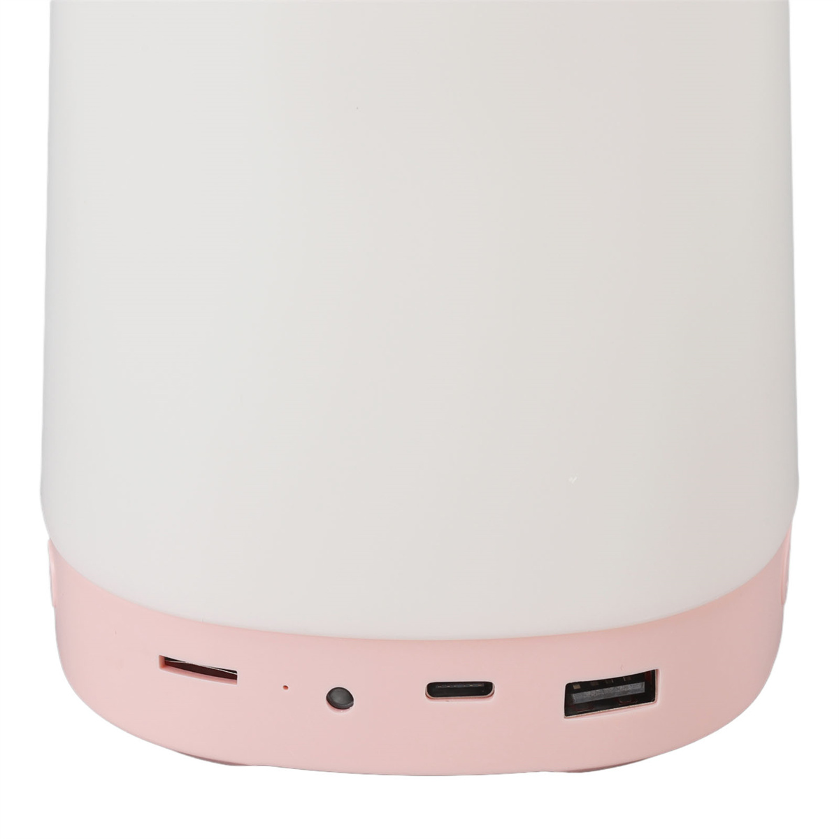 Zylindrische Lampe in Weiß und Rosa, mit USB- und anderen Anschlüssen am Sockel.