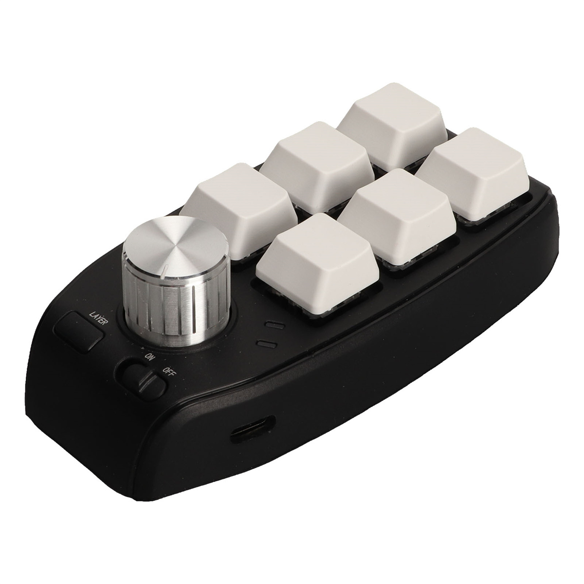 Schwarze Tastatur mit weißen Tasten und einem silbernen Drehregler. Ein/Aus-Schalter sichtbar.