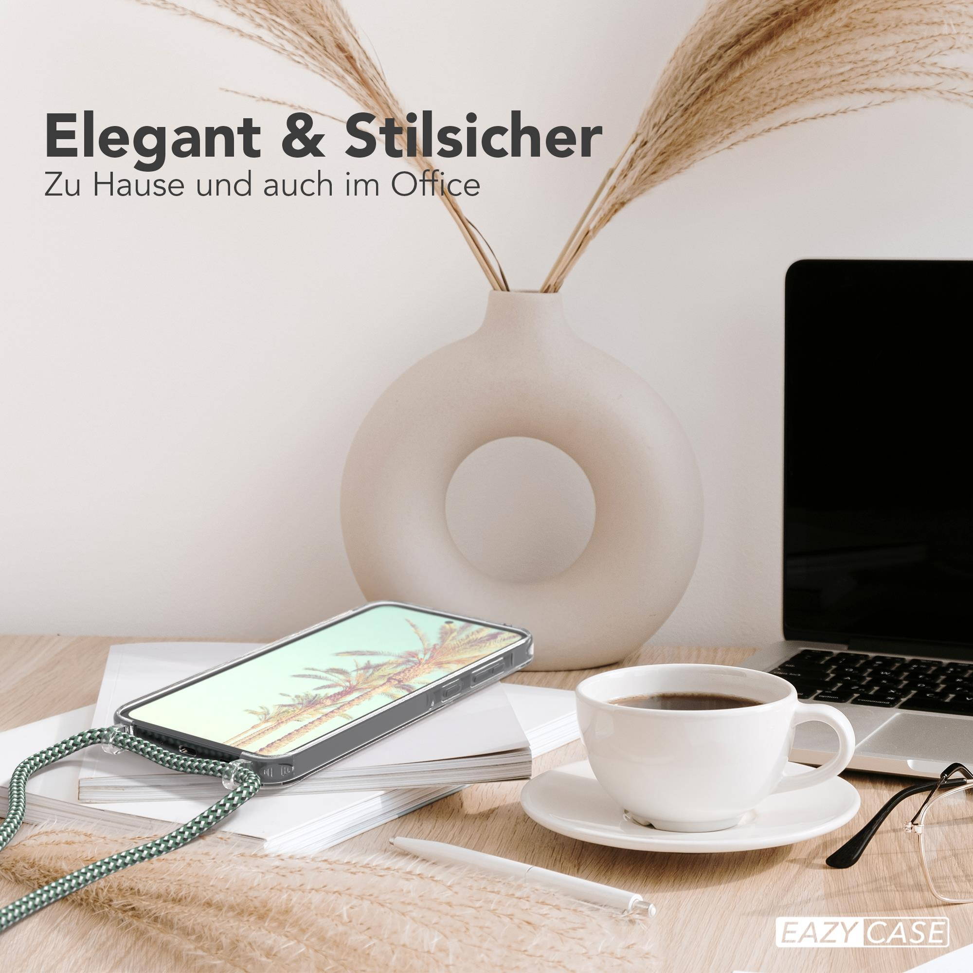 Handyhülle mit Telefon auf dem Schreibtisch neben Kaffee und Laptop.
