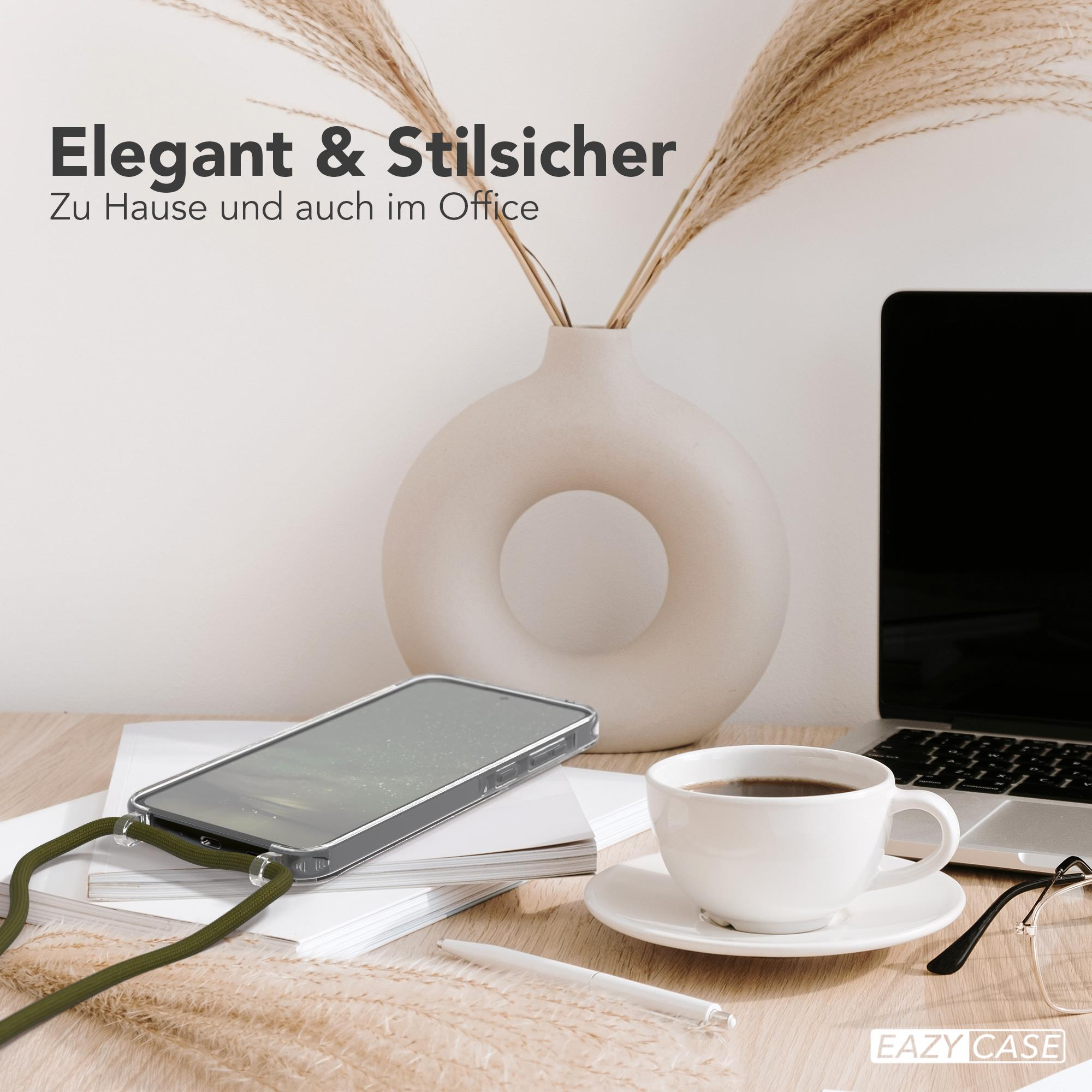 Telefon auf Schreibtisch mit Kaffee, Vase mit Pflanzen, Text: Dein Style.