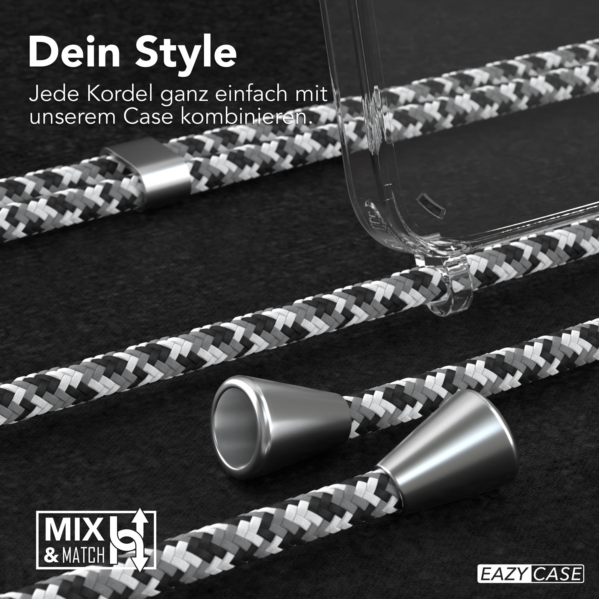 Nahaufnahme von Handyriemen-Zubehör. Der Riemen ist schwarz-weiß und hat silberne Metallteile.