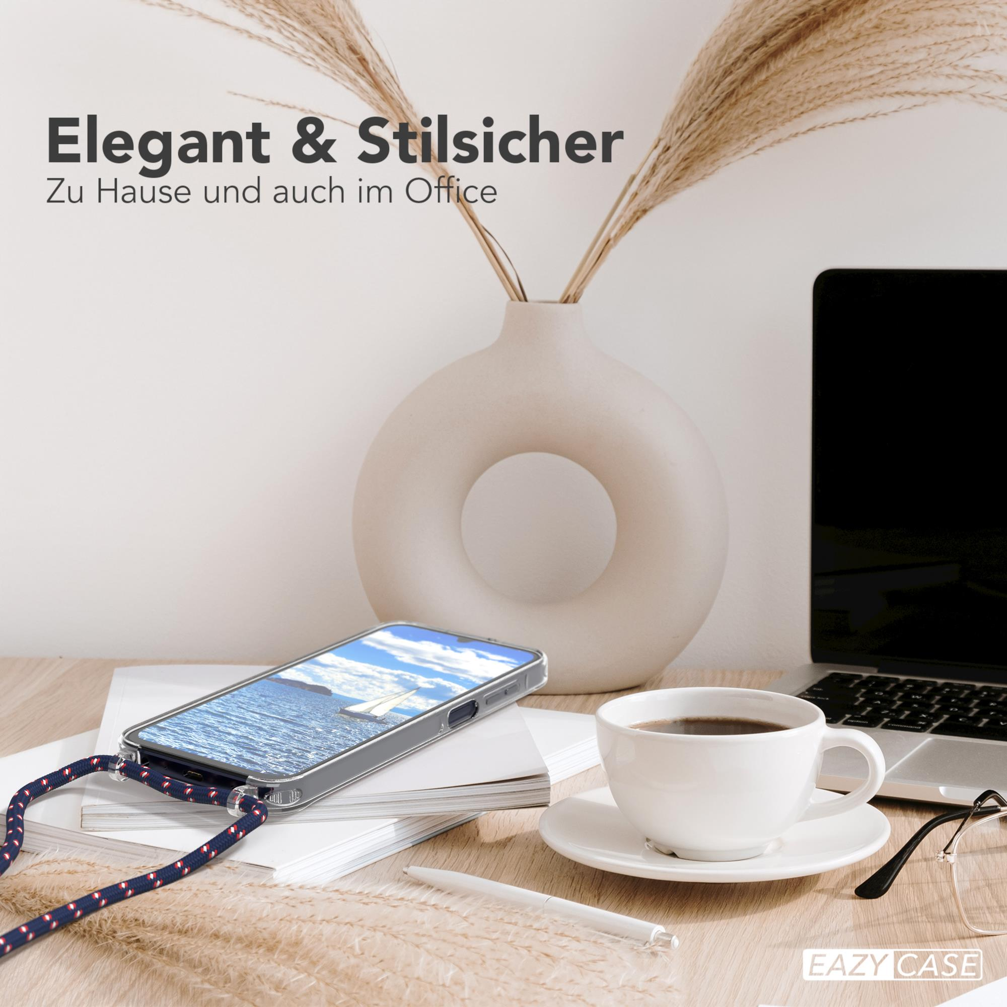 Handy mit Band auf dem Schreibtisch, mit Laptop, Stift und Kaffeetasse.