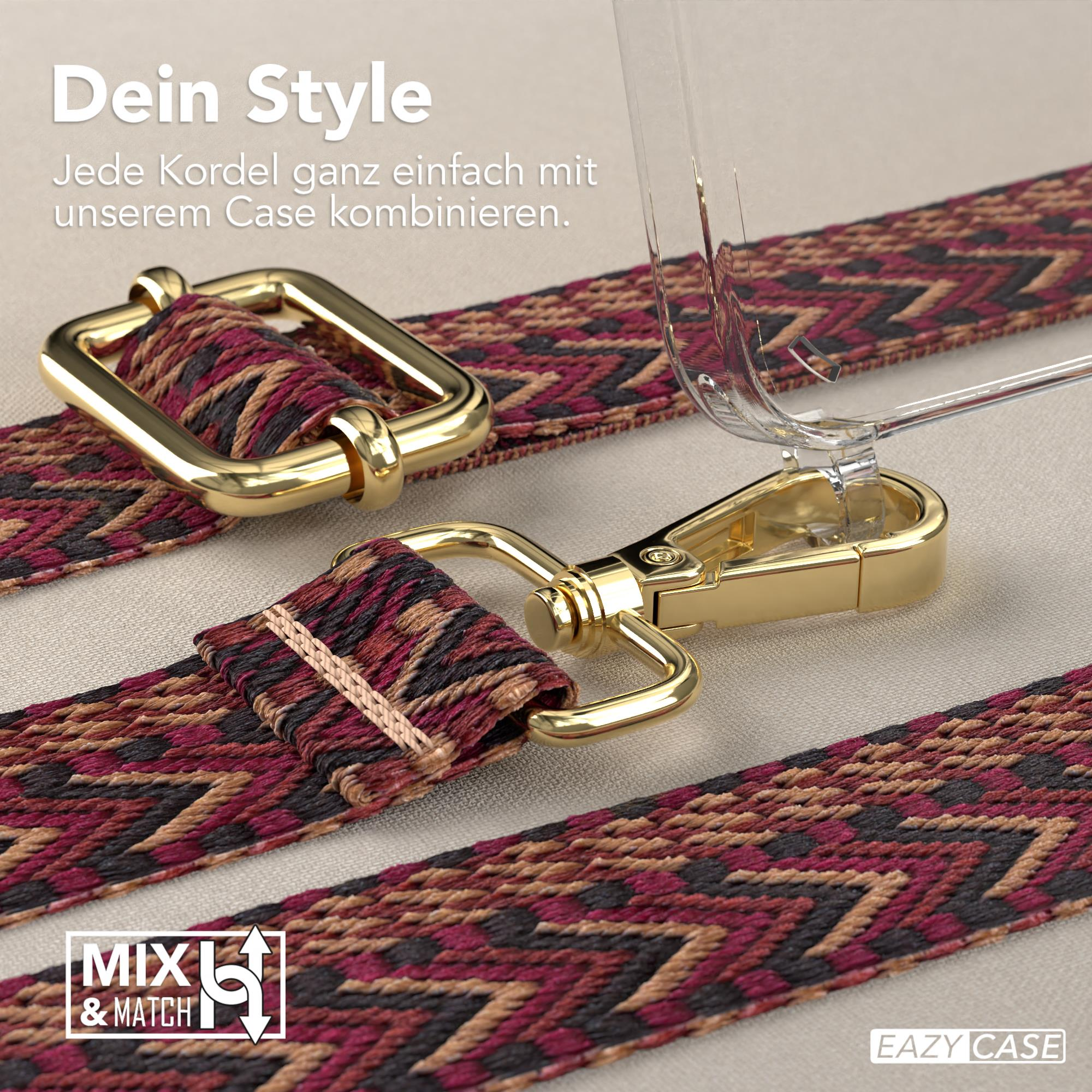 Nahaufnahme eines Riemens mit goldener Hardware und gewebtem Stoff in Rot- und Schwarztönen.