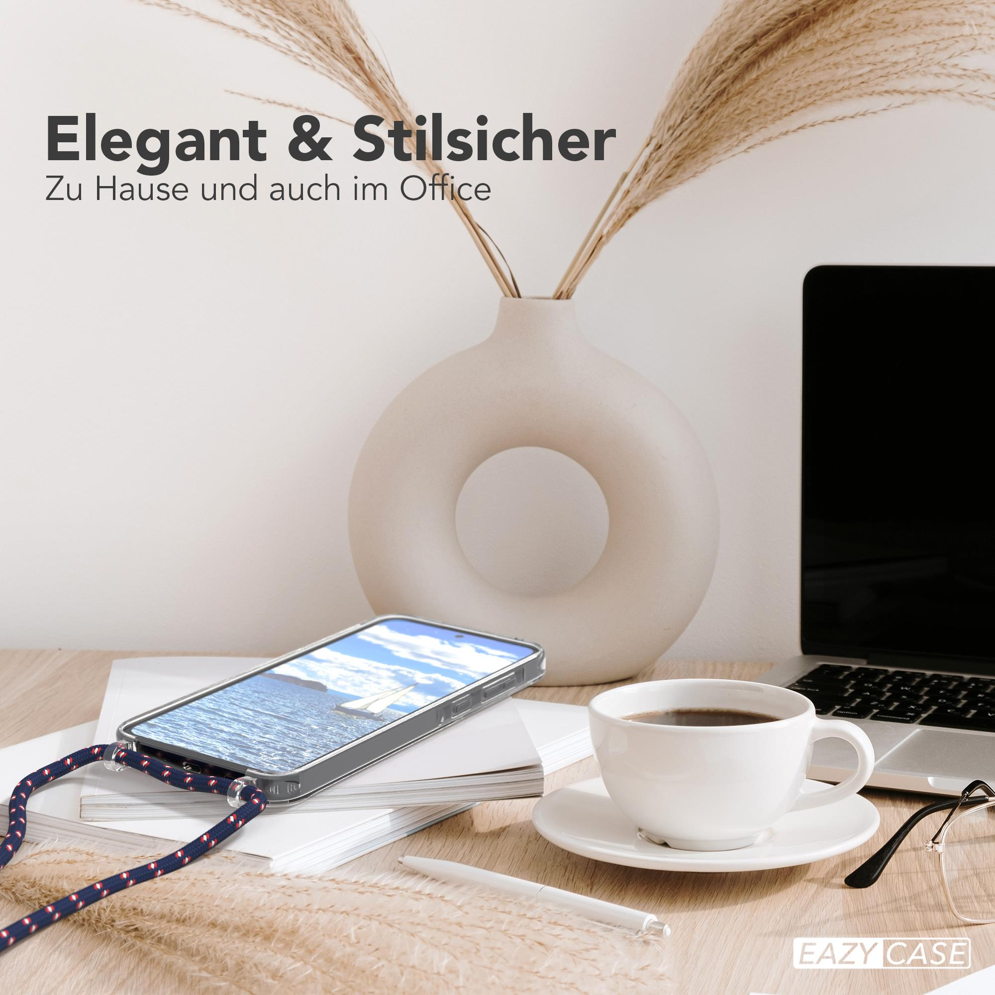 Telefon auf dem Schreibtisch mit Lanyard. Vase und Computer. Elegante und stilvolle Umgebung.