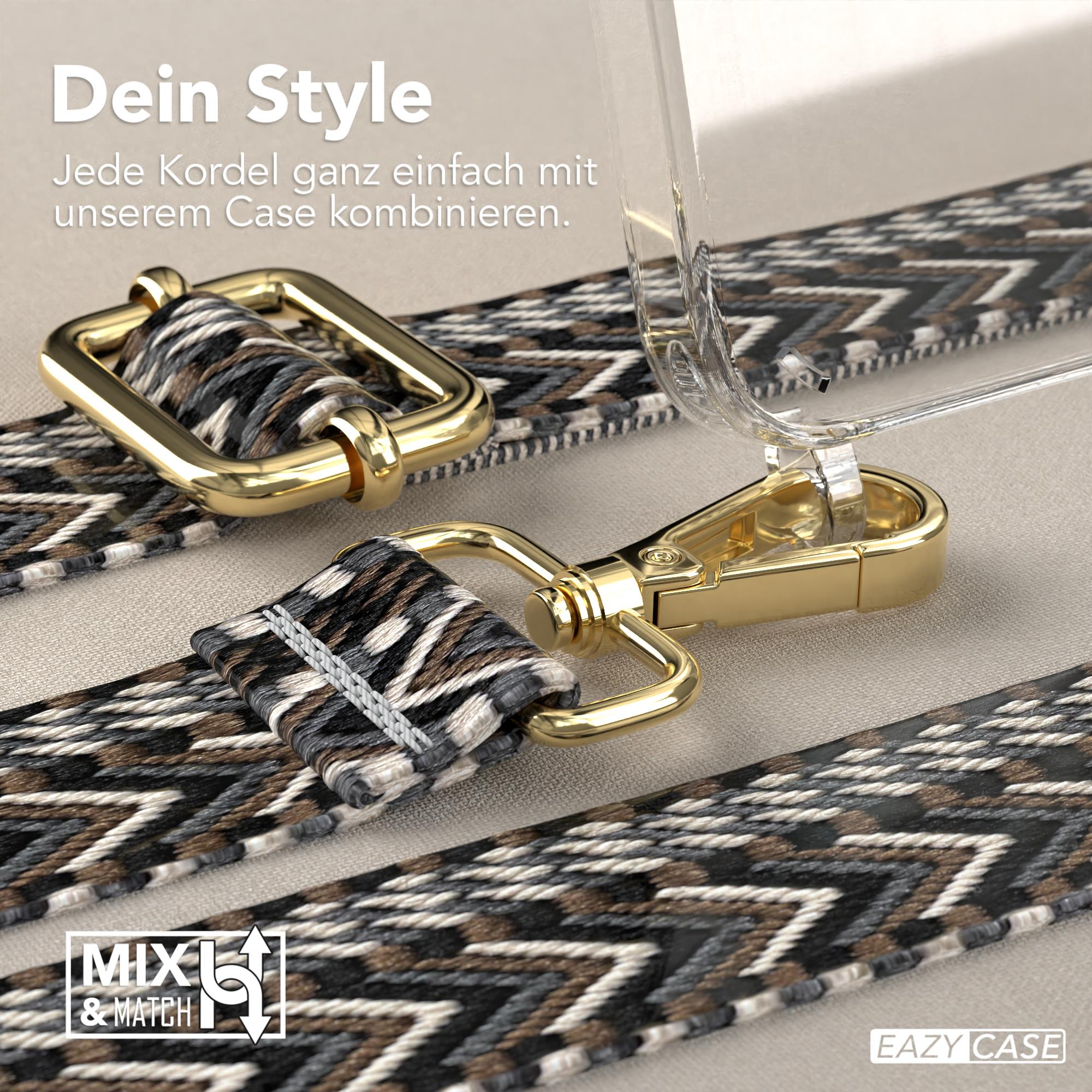 Nahaufnahme einer durchsichtigen Handyhülle und eines gemusterten Riemens mit goldenen Metallbefestigungen.