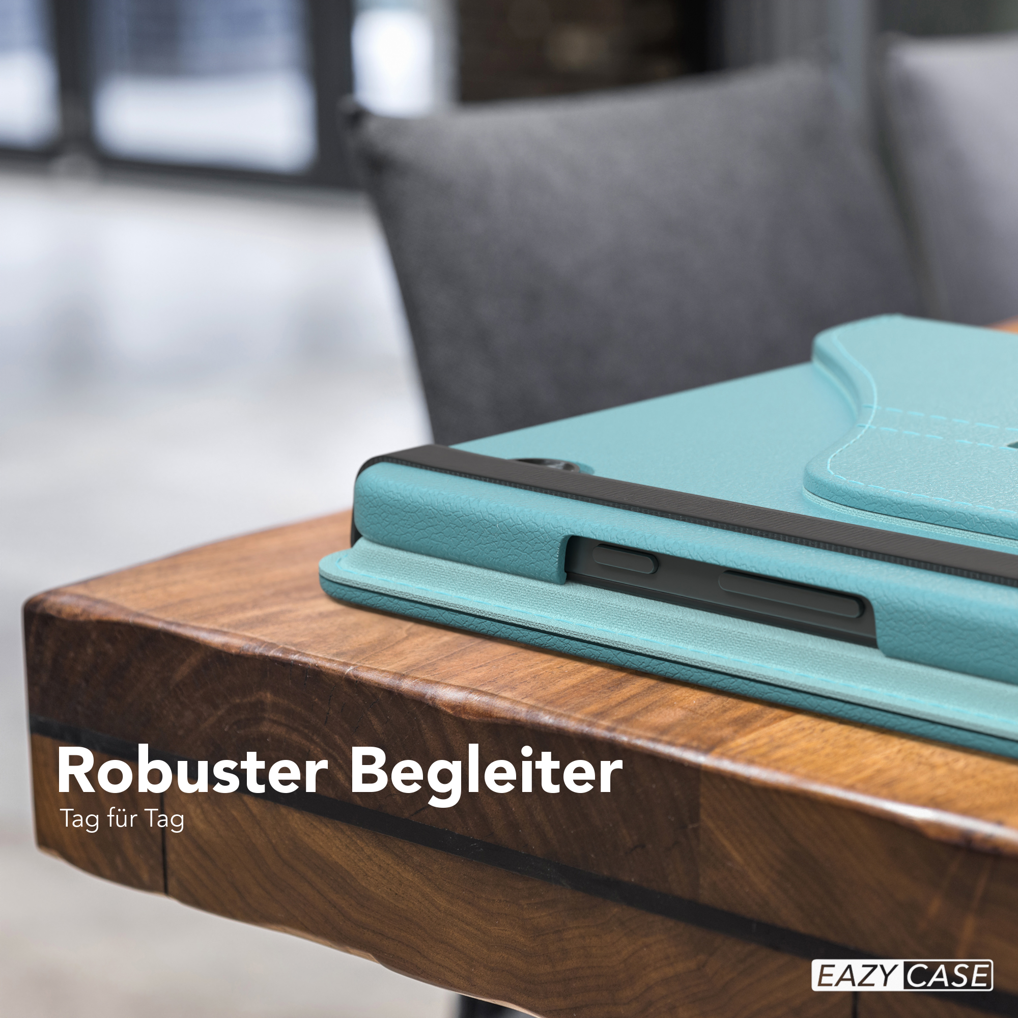 Nahaufnahme einer teal Tablet-Hülle auf einem Holztisch mit Text.