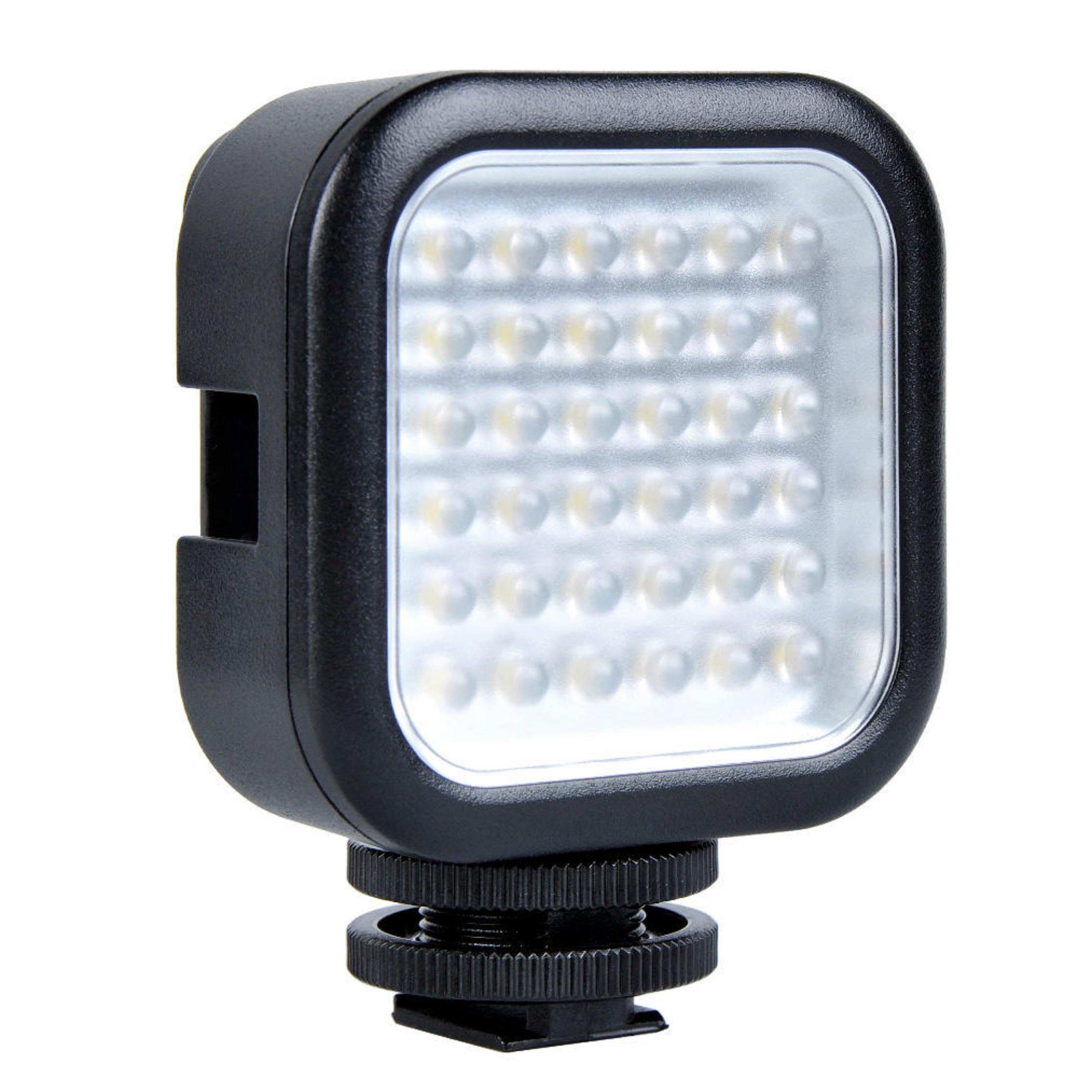 Schwarzes, quadratisches LED-Videolicht mit vielen kleinen Glühbirnen. Das Licht ist auf weißem Grund.