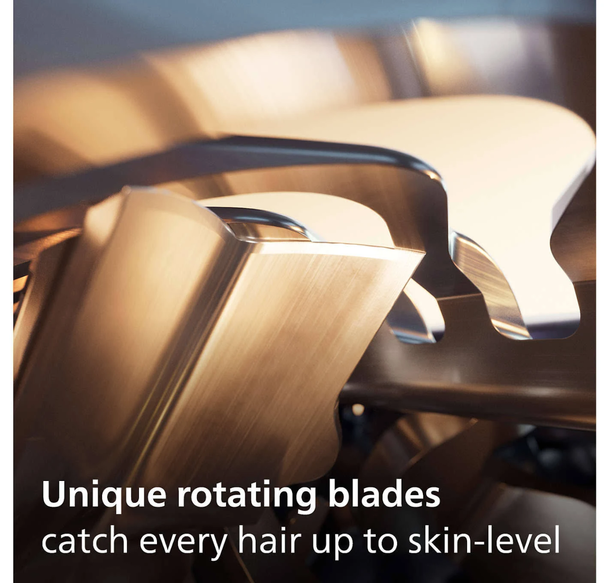 Zbliżenie obracających się ostrzy golarki.