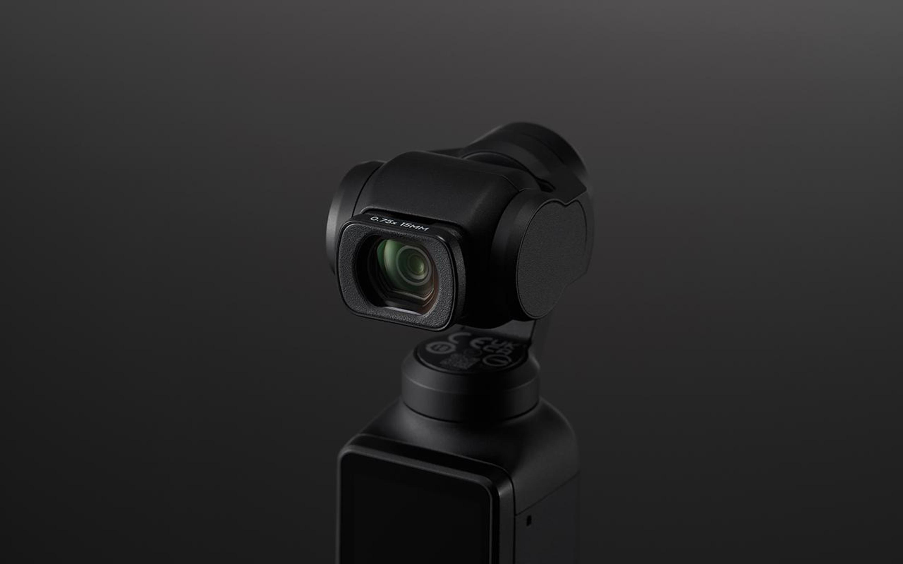 Una fotocamera gimbal nera su sfondo nero.