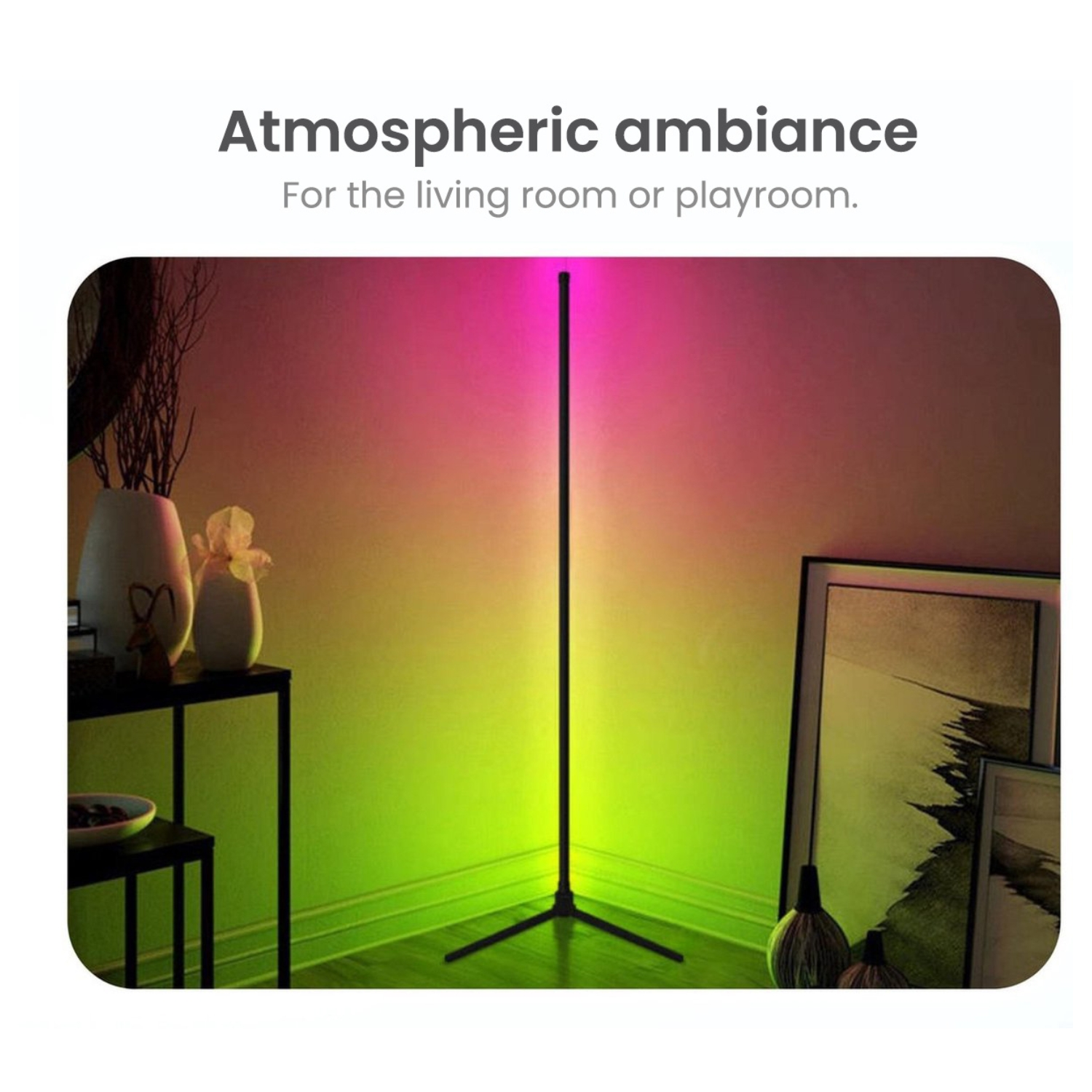 Tall floor lamp with green and pink light, in a room setting.