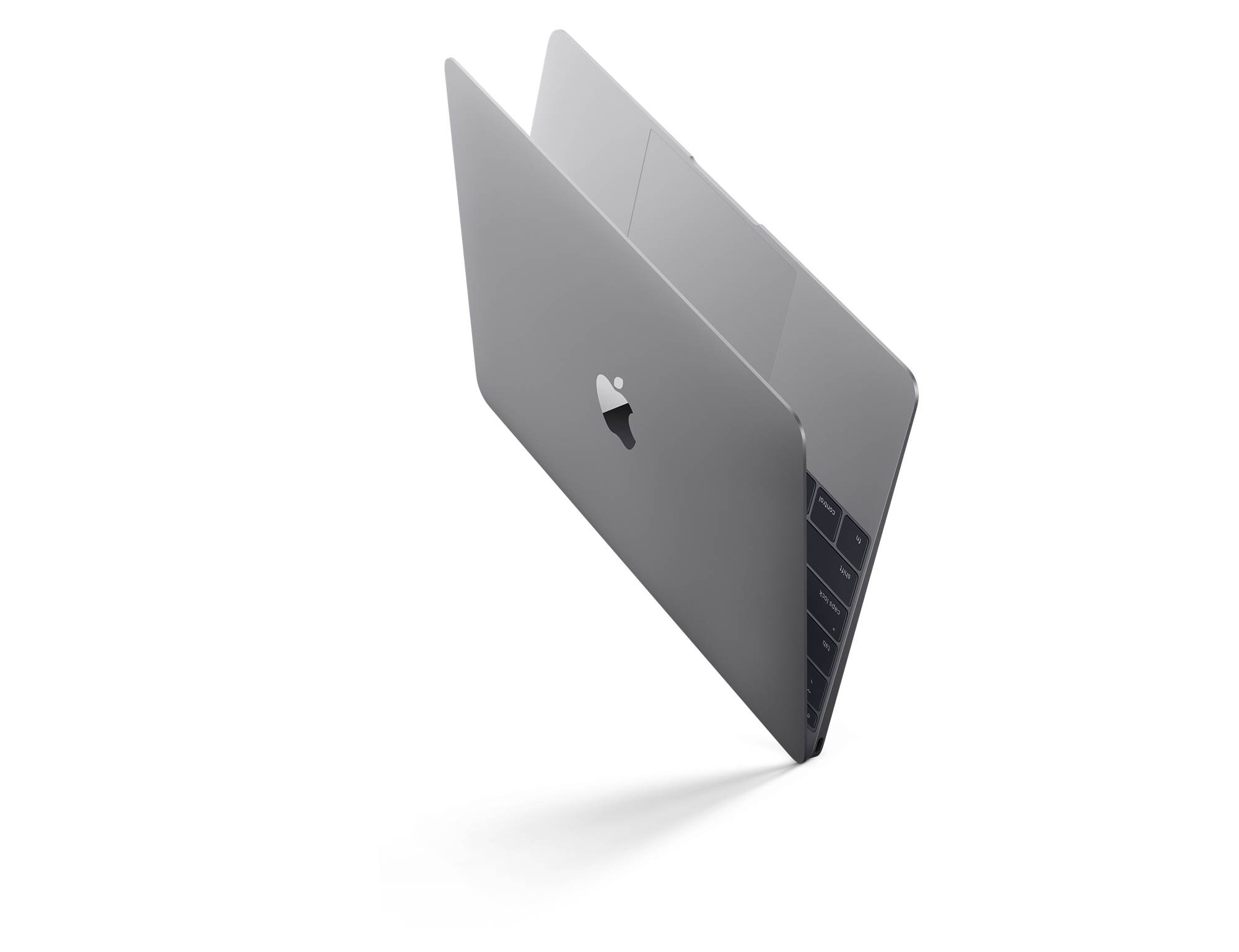 Ein MacBook-Laptop in Draufsicht, leicht abgewinkelt vor weißem Hintergrund.