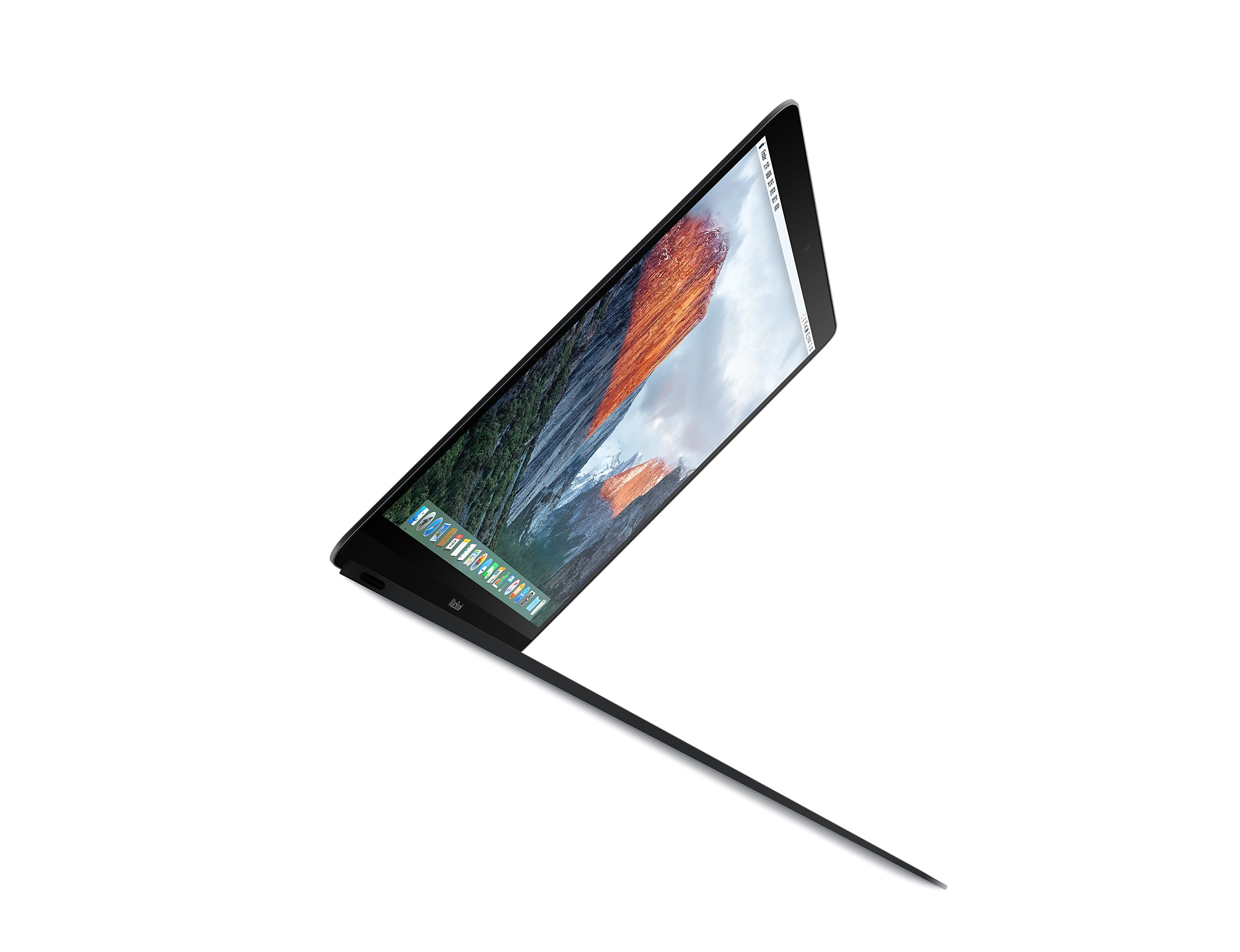 Czarny laptop na białym tle, widok pod kątem, ekran z górami i niebem.