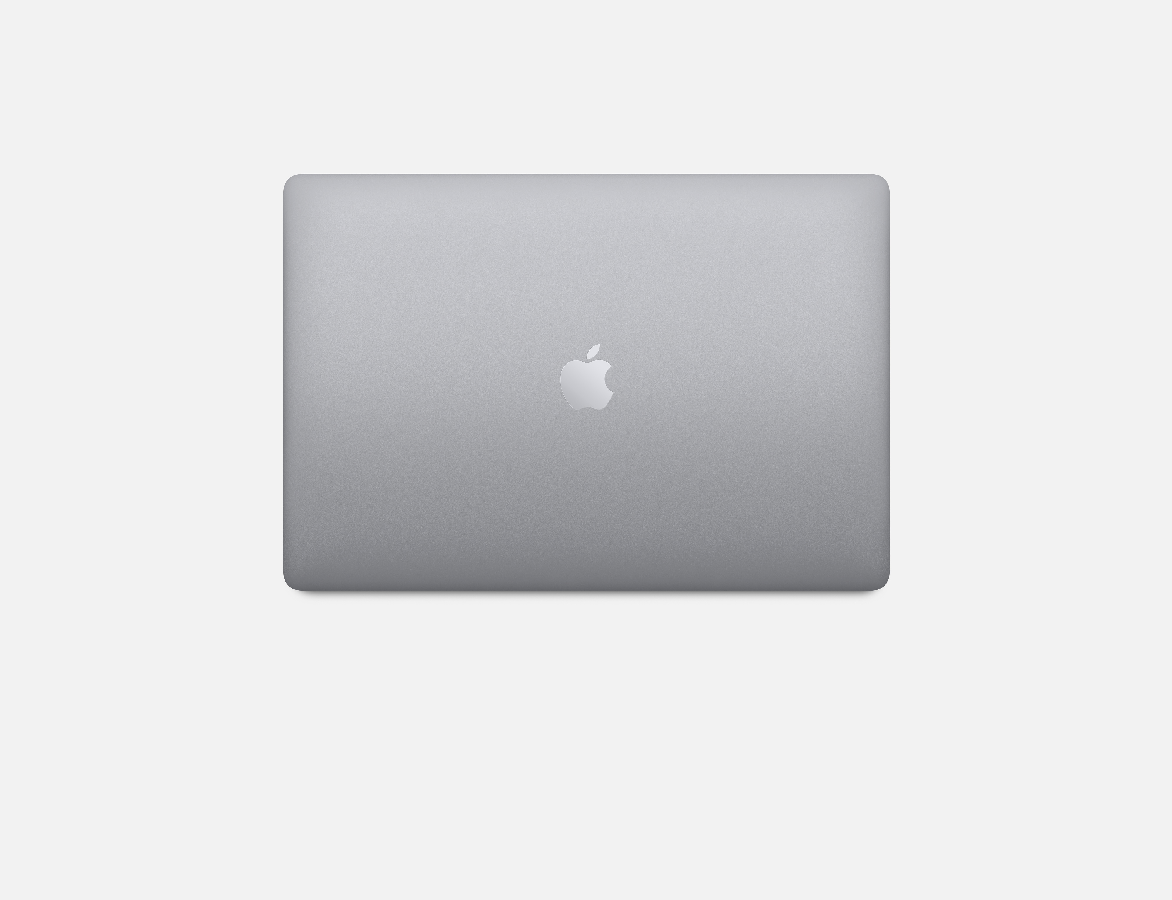 Zamknięty szary laptop z logo Apple. Białe tło.