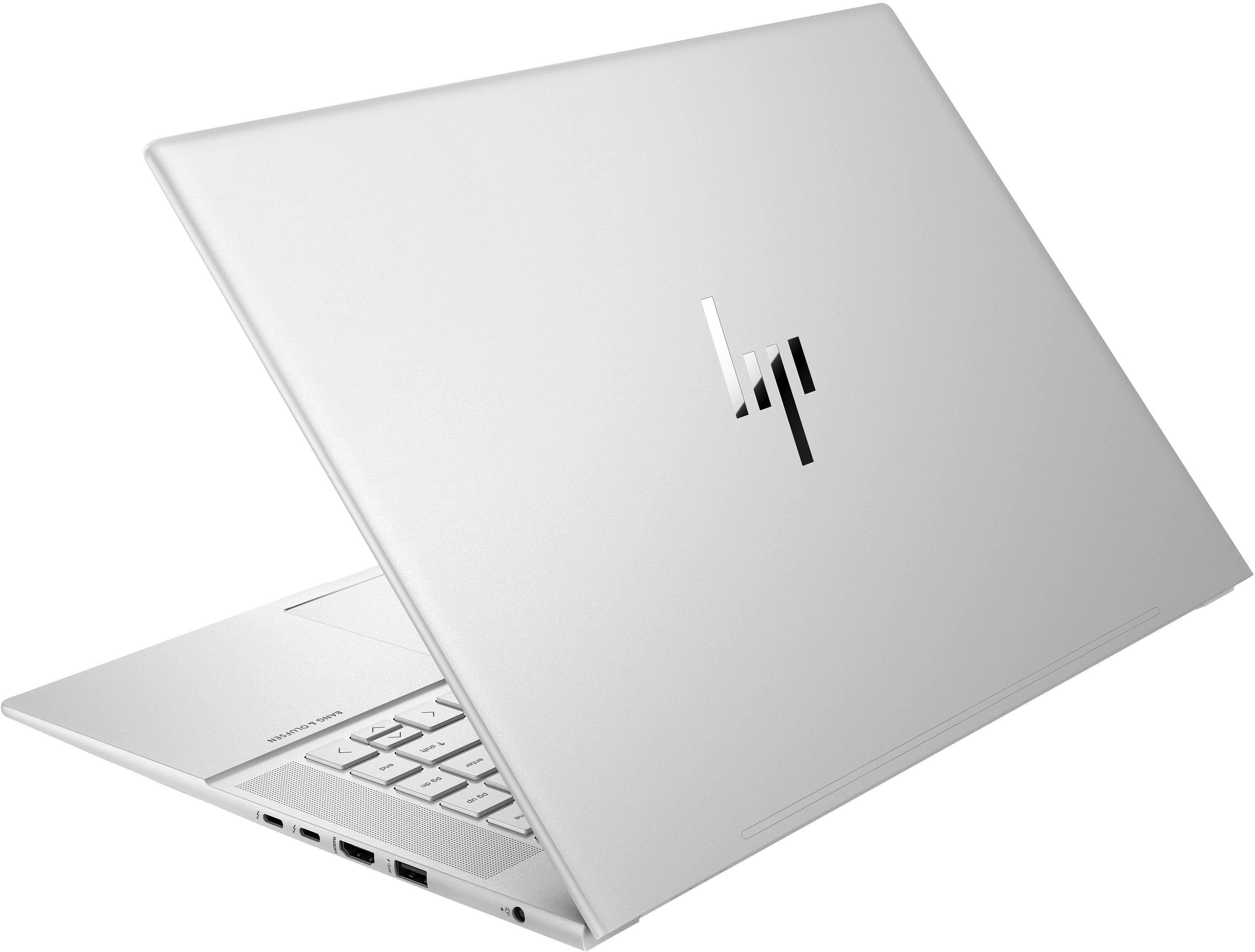 Srebrny laptop HP, widok z tyłu, częściowo otwarty. Logo HP na pokrywie.