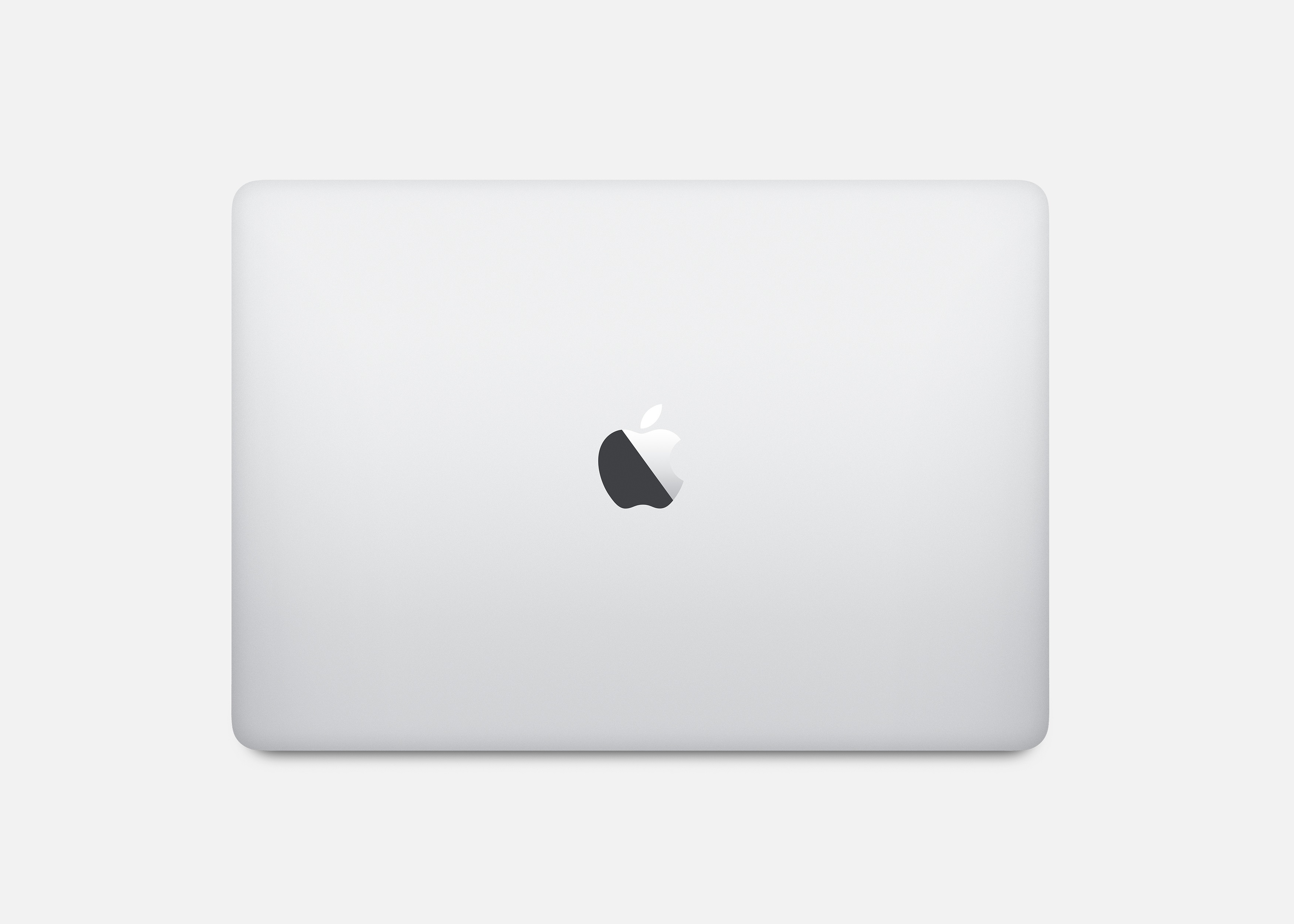 Parte trasera de portátil Apple blanco con logo Apple.