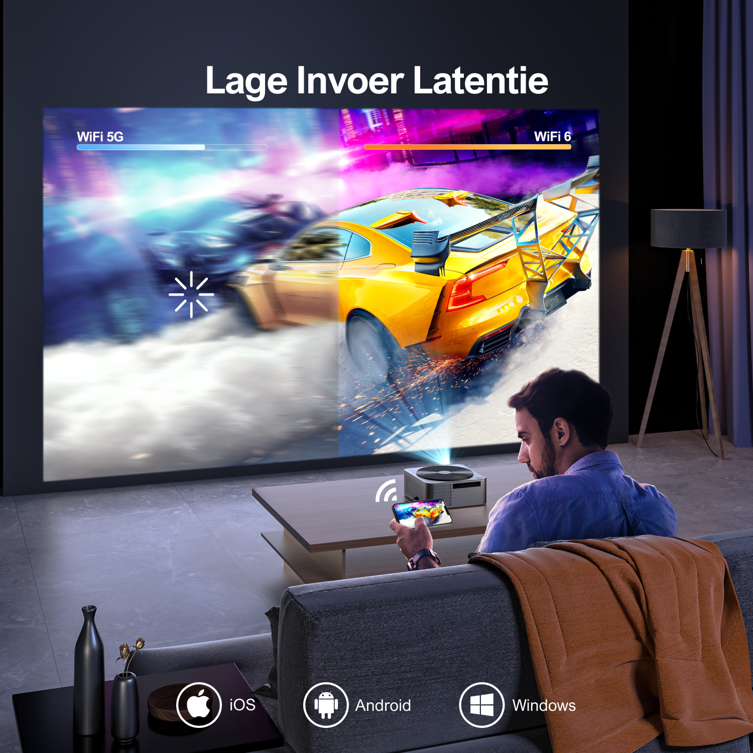A person watching a screen projecting a car racing game scene, with phone on the table.