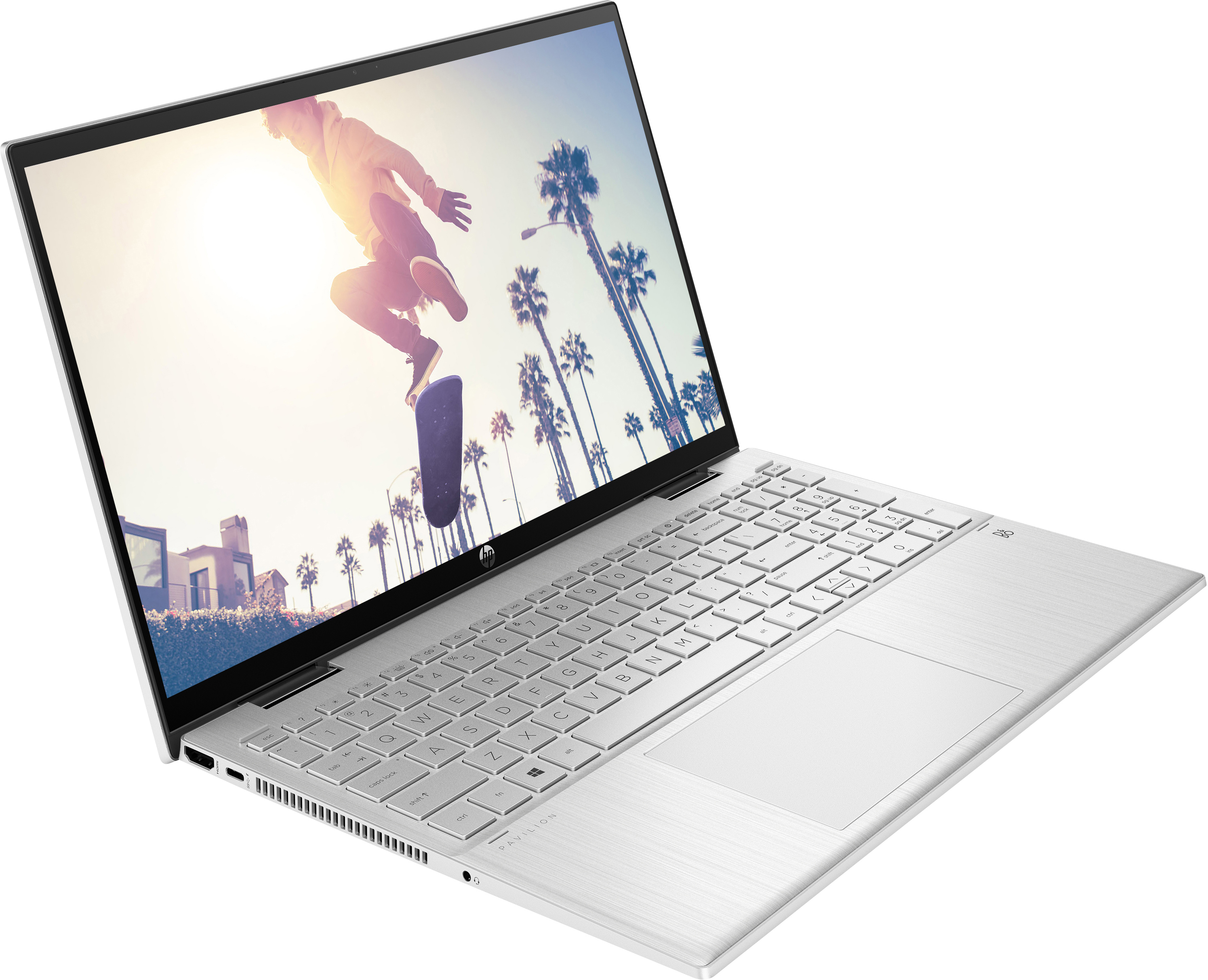 Ein silberner Laptop ist geöffnet und zeigt den Bildschirm mit einem Skateboarder und Palmen.