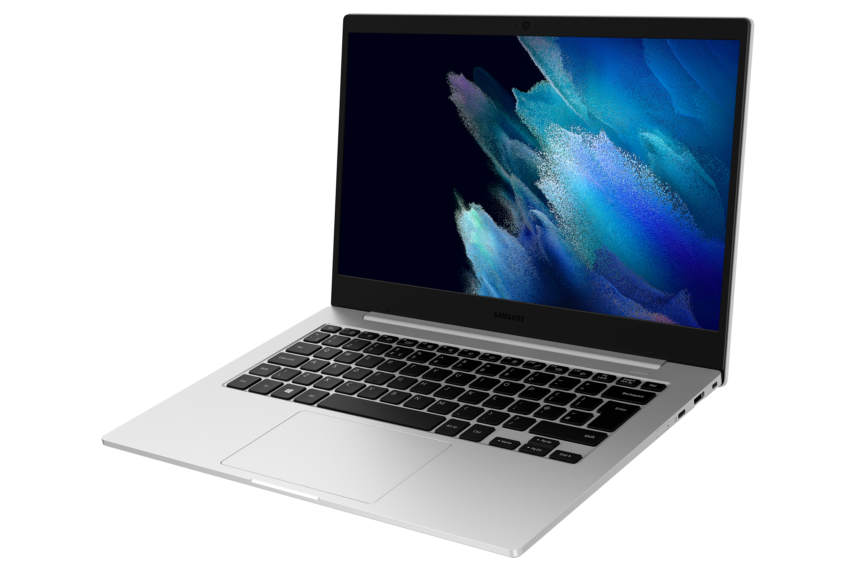 Ein silberner Laptop ist von hinten leicht geöffnet auf einer weißen Oberfläche zu sehen.