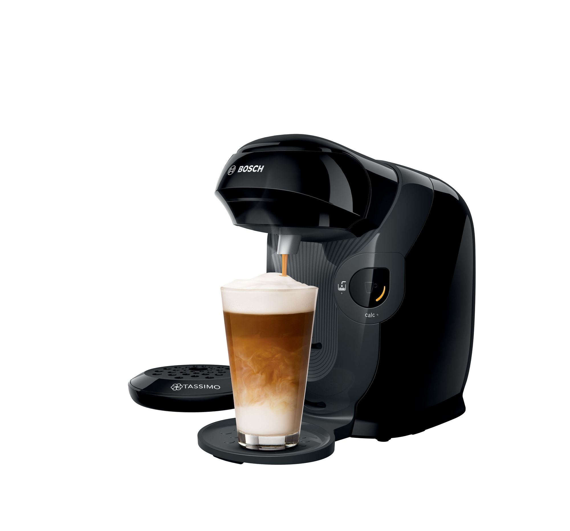 Macchina da caffè Tassimo nera. Il caffè si versa in un bicchiere con latte a strati.
