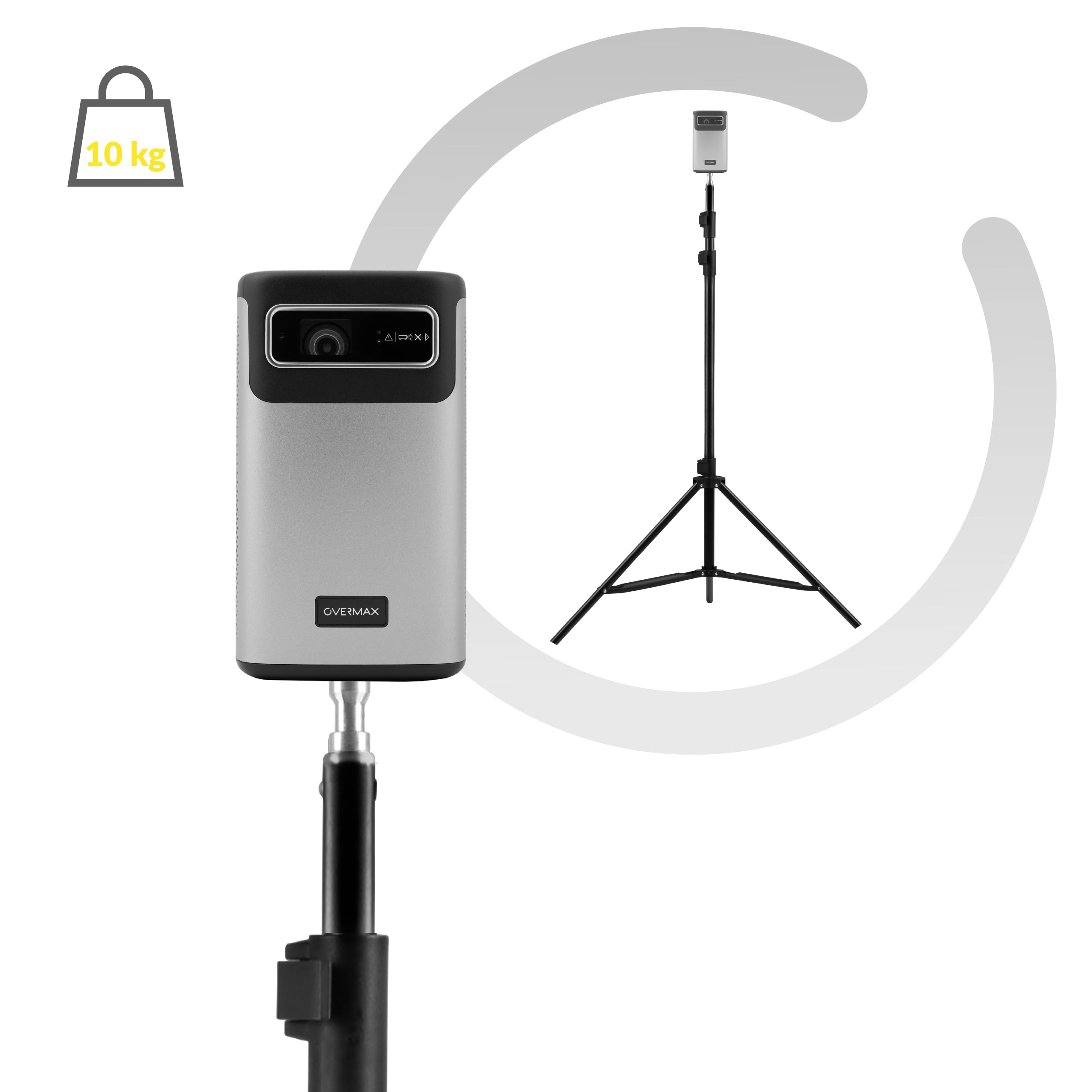 Srebrzystoszare urządzenie na statywie, małe urządzenie na statywie. Pokazano ciężar 10 kg.